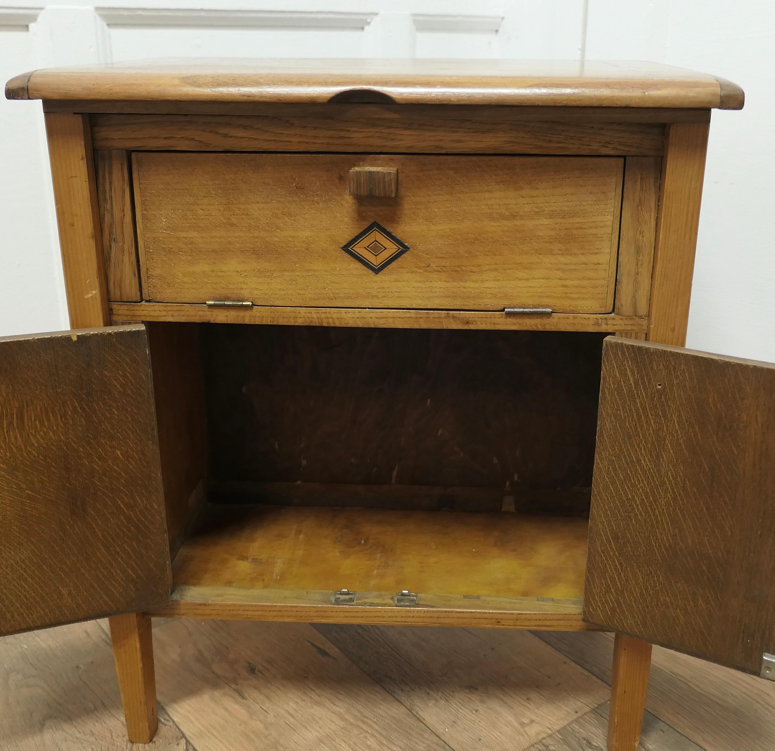 Mid-20th Century Walnut Sewing Cabinet  This is a good and useful little cupboard   For Sale