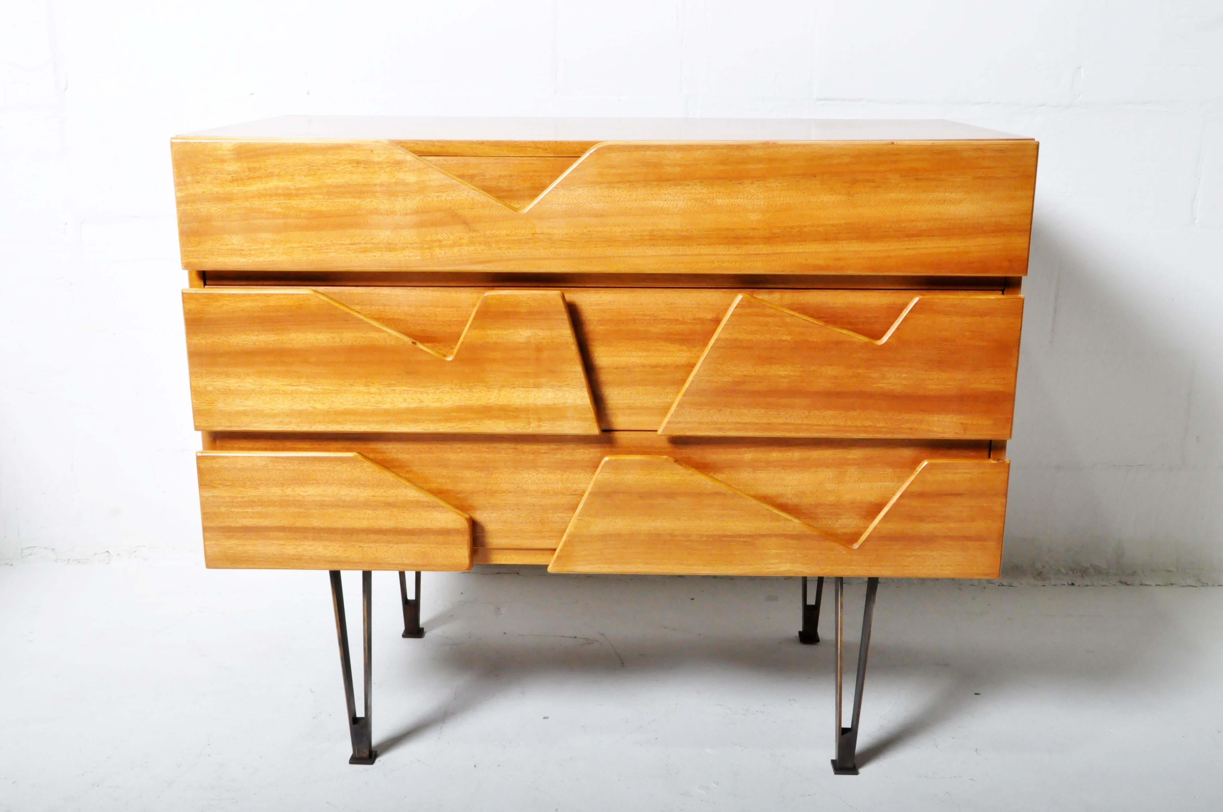 This walnut side chest dates to the 1960's and is an example of 