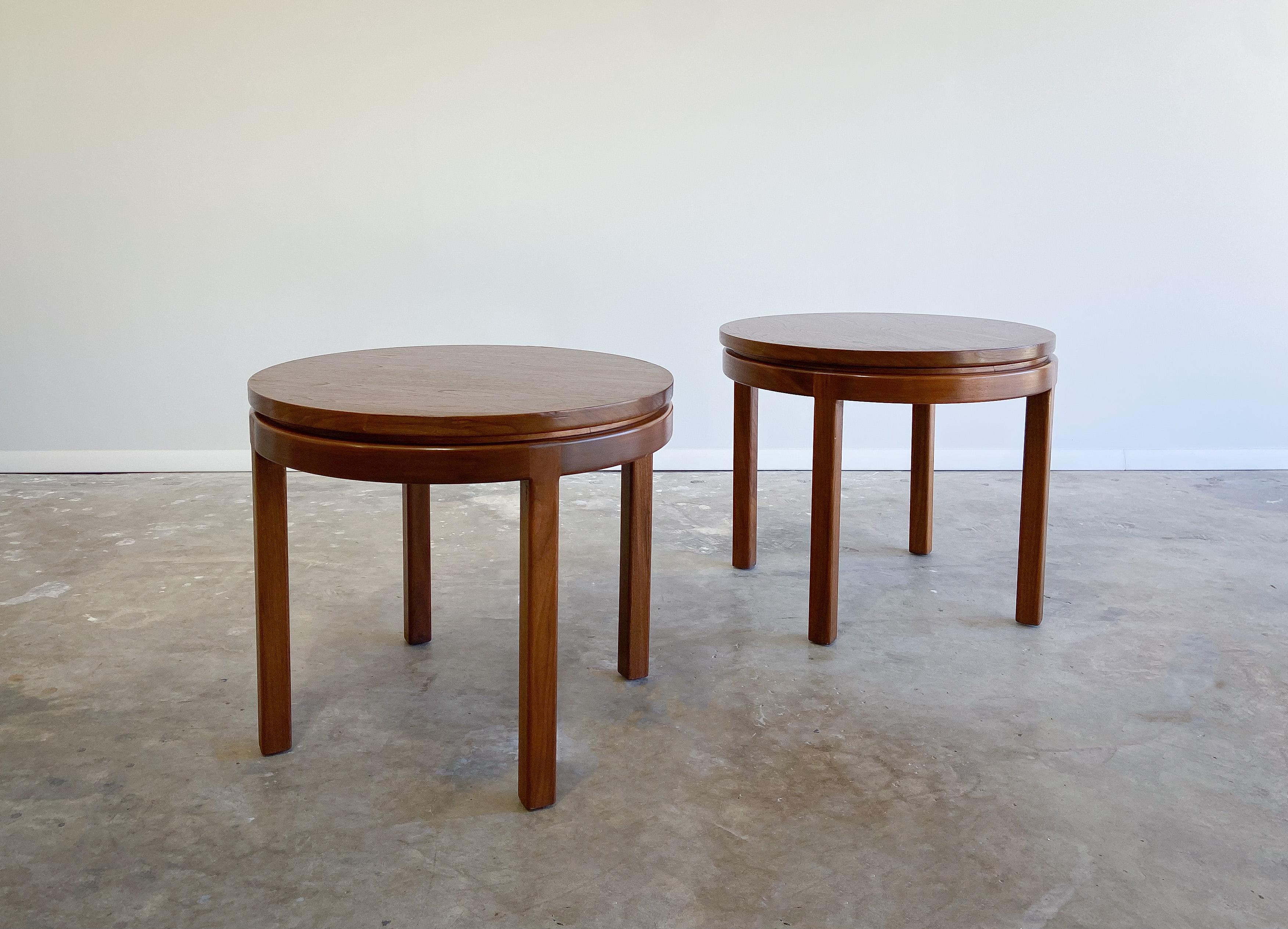 Offered is a well made pair of walnut tables that would function well either as side or end tables. Very much in the manner of Edward Wormley for Dunbar with similar build quality and details. 

Both tables are solid and sturdy with some minor