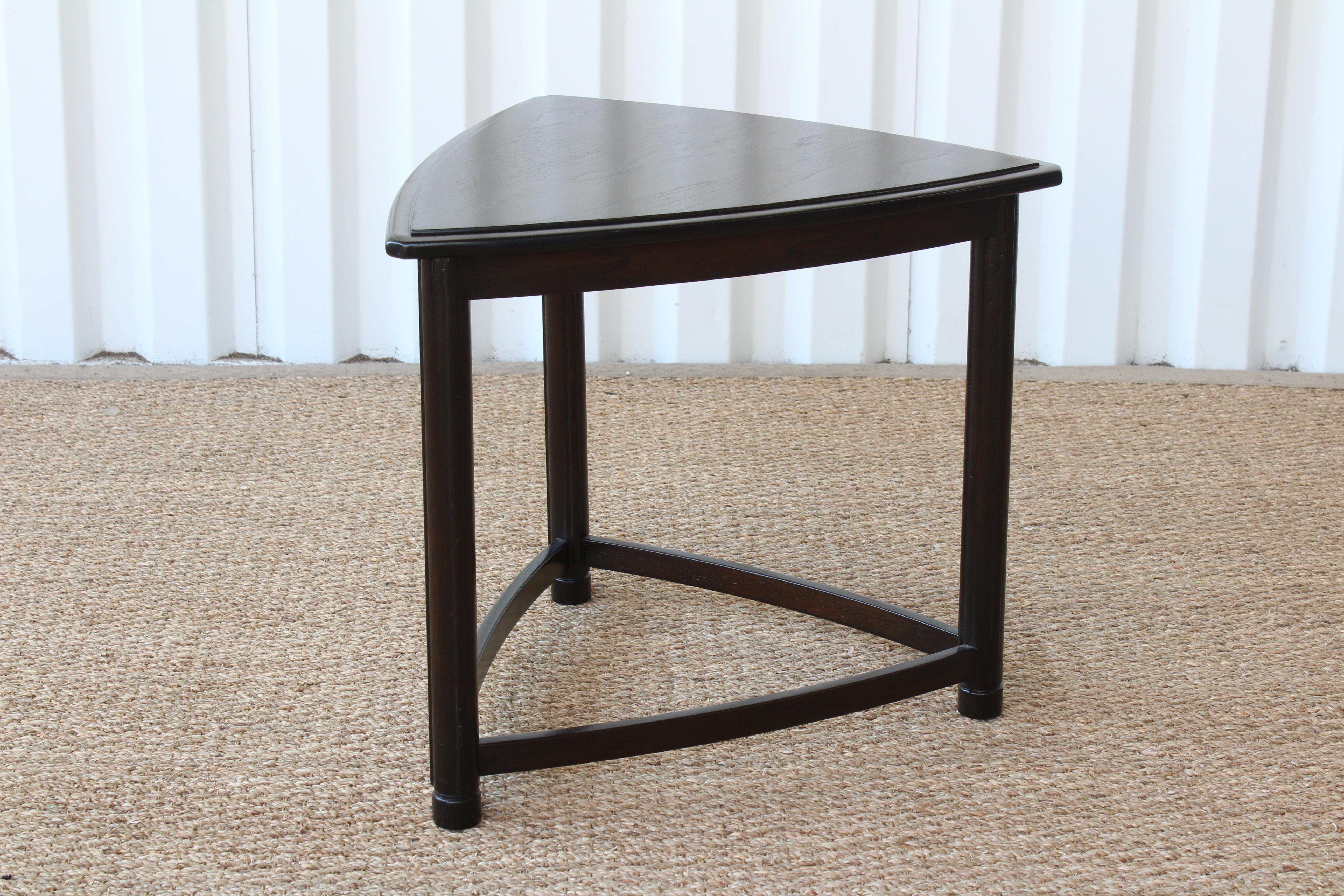 Walnut three sided occasional table by Heritage Henredon. Newly refinished in a dark stain.