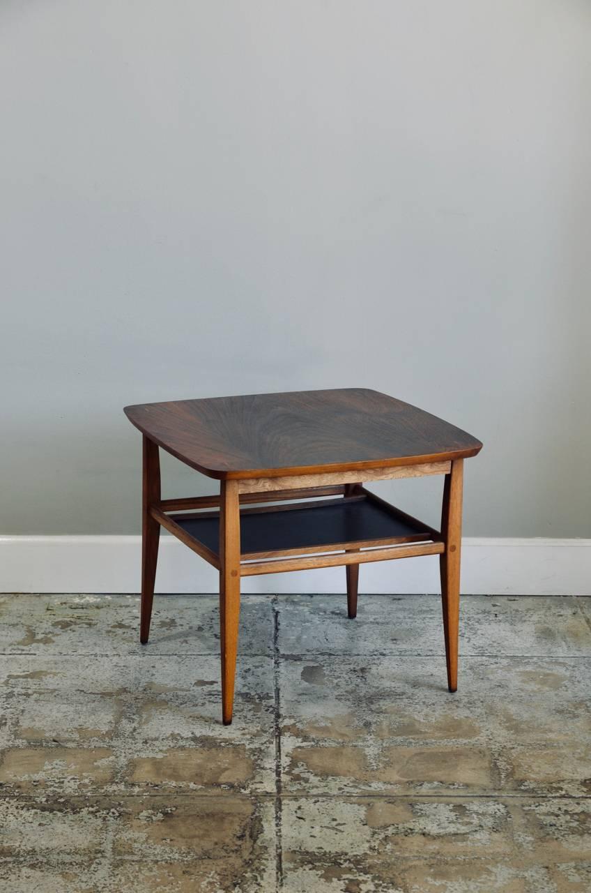 Walnut side table by Lane.

Dimensions of bottom shelf: 13