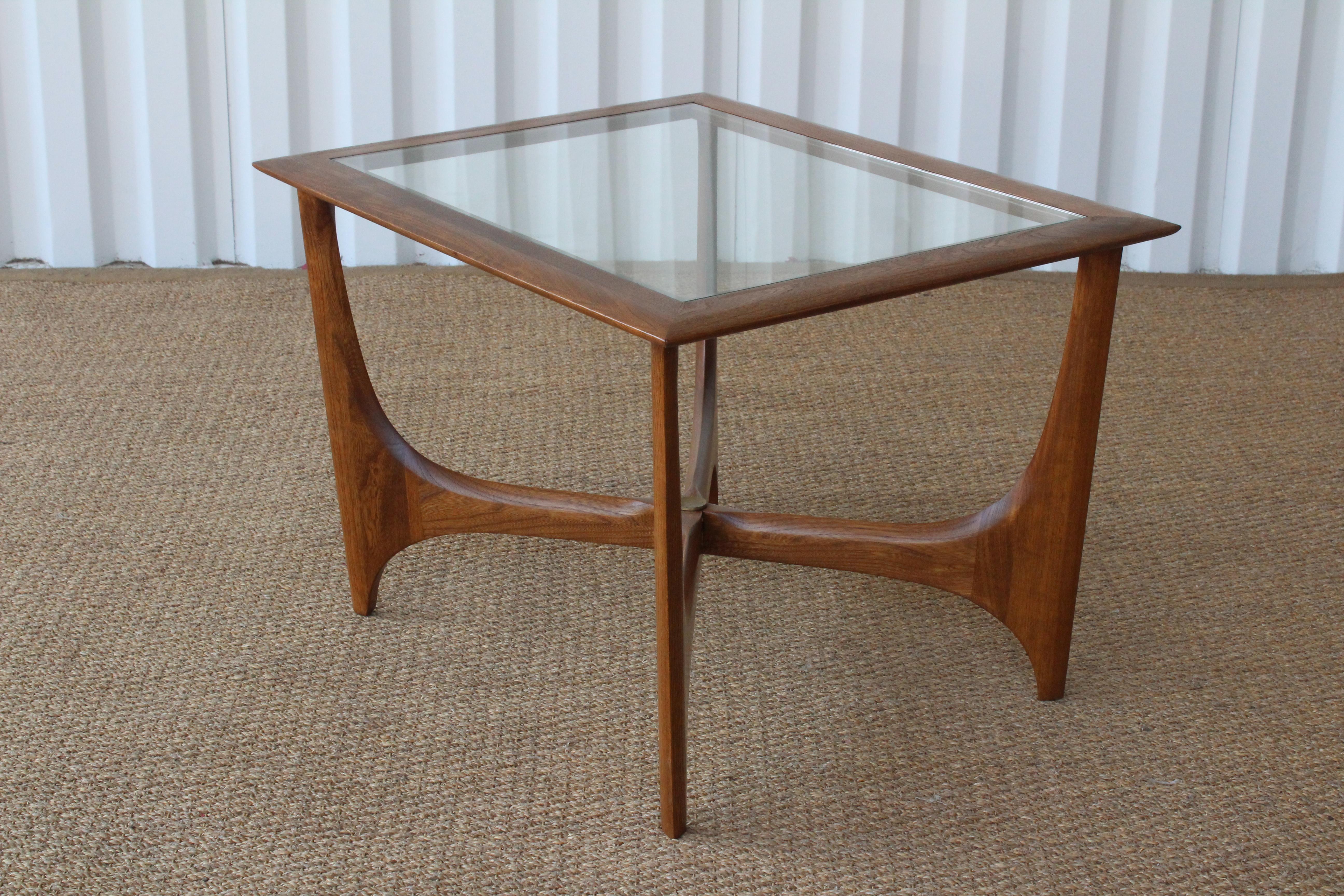 Sculptural walnut side table by Lane with new glass insert top, USA, 1960s. Newly refinished.