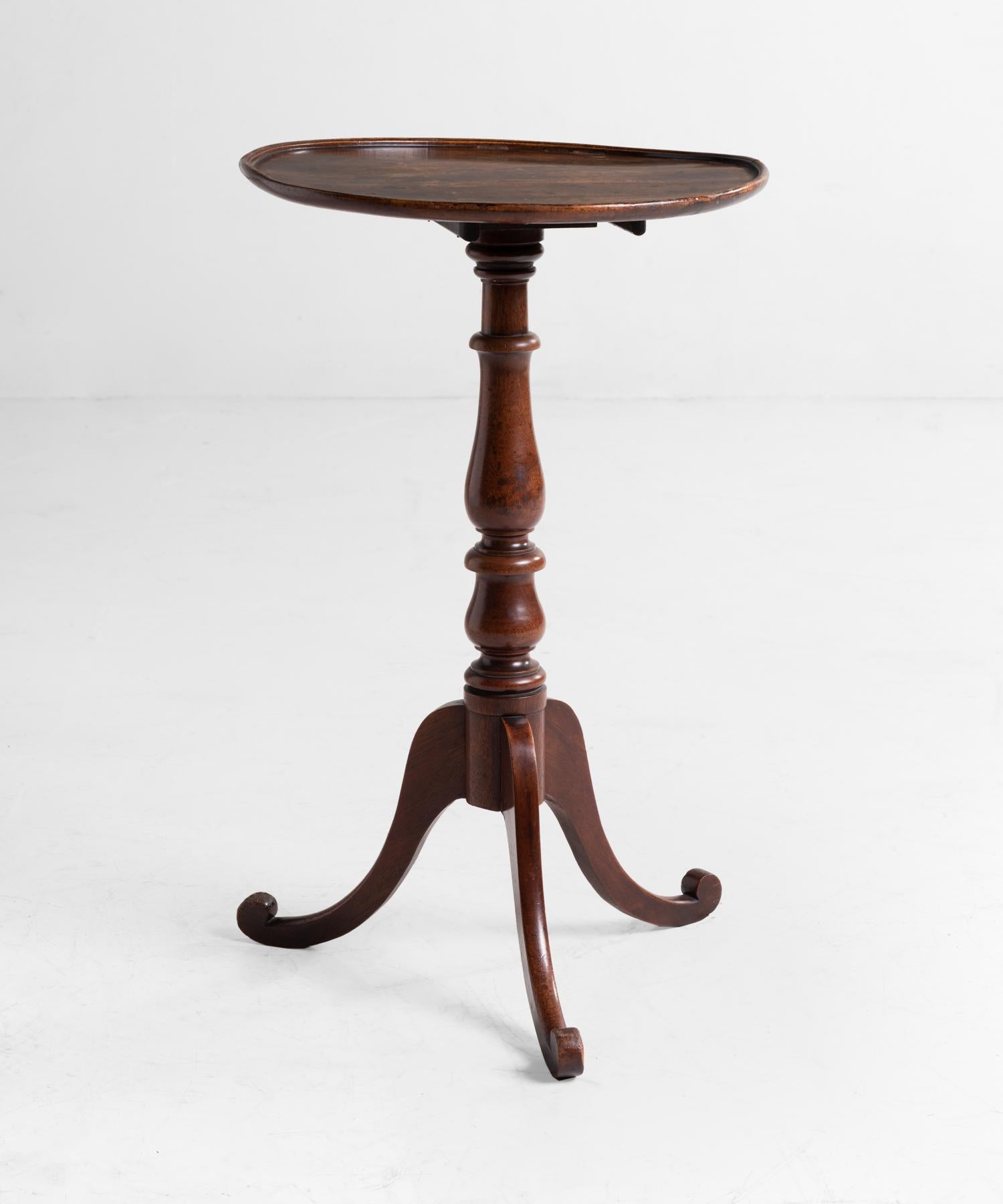 Walnut side table, circa 1840.

Elegant form with hand turned stand and incredible patina.