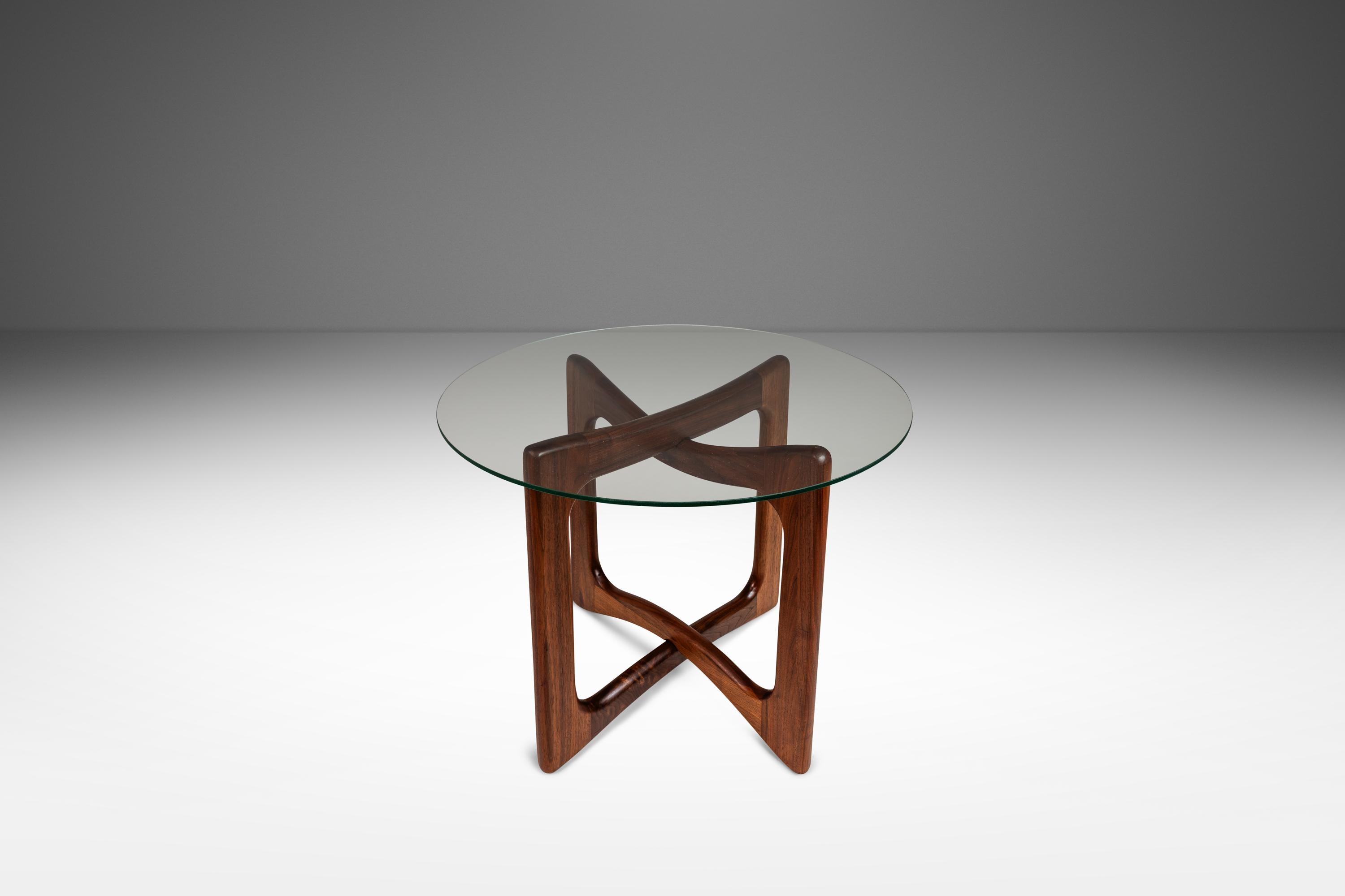 Introducing a newly restored side table designed by the incomparable Adrian Pearsall in the late 1950's and crafted by Craft Associates in the early 1960's. Featuring a base made from solid black American walnut with extraordinary woodgrains this