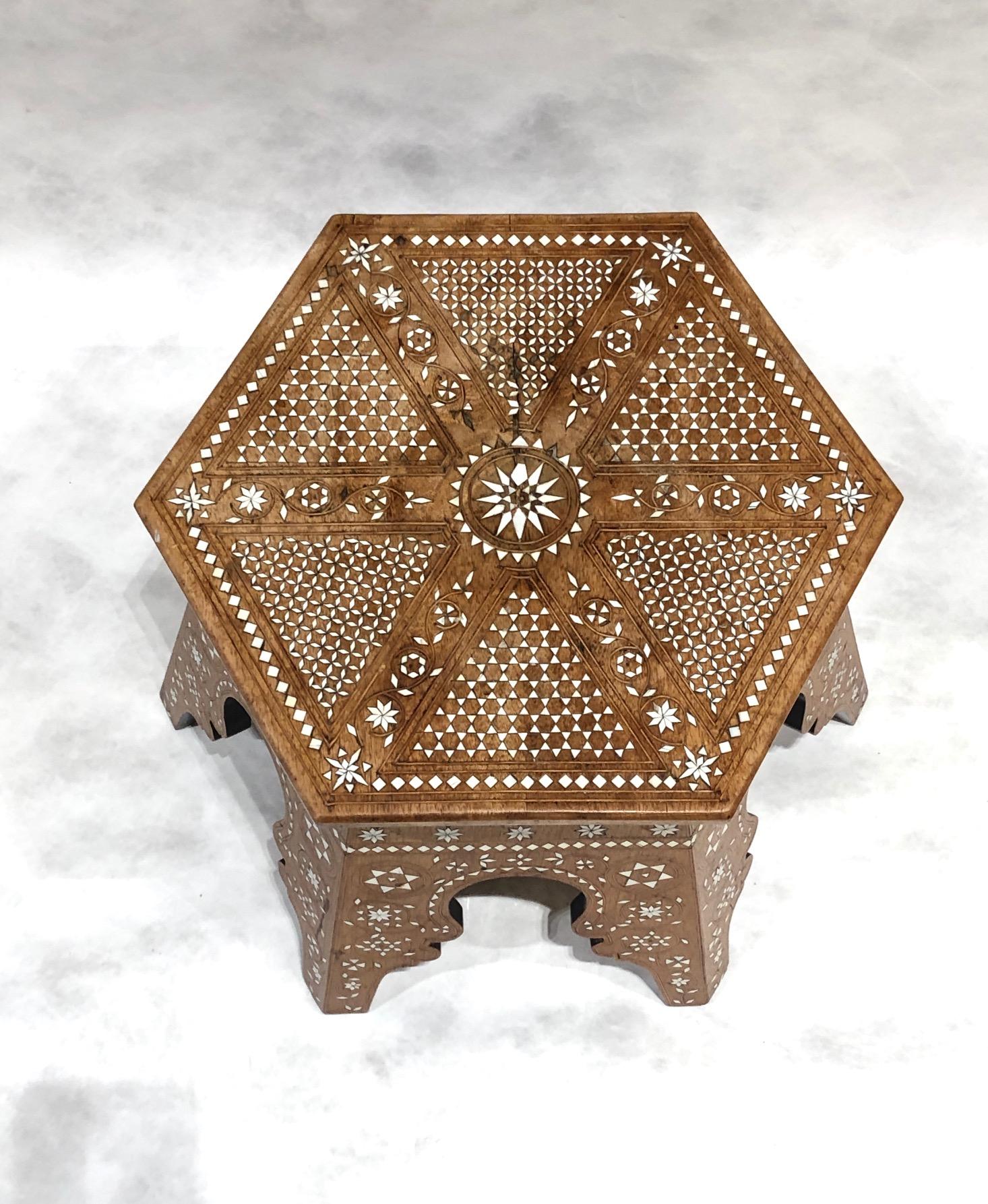 Beautiful walnut side table with bone inlays, circa 1900.