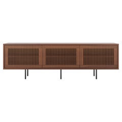 Walnut sideboard TV stand with three slatted doors in mid century modern style