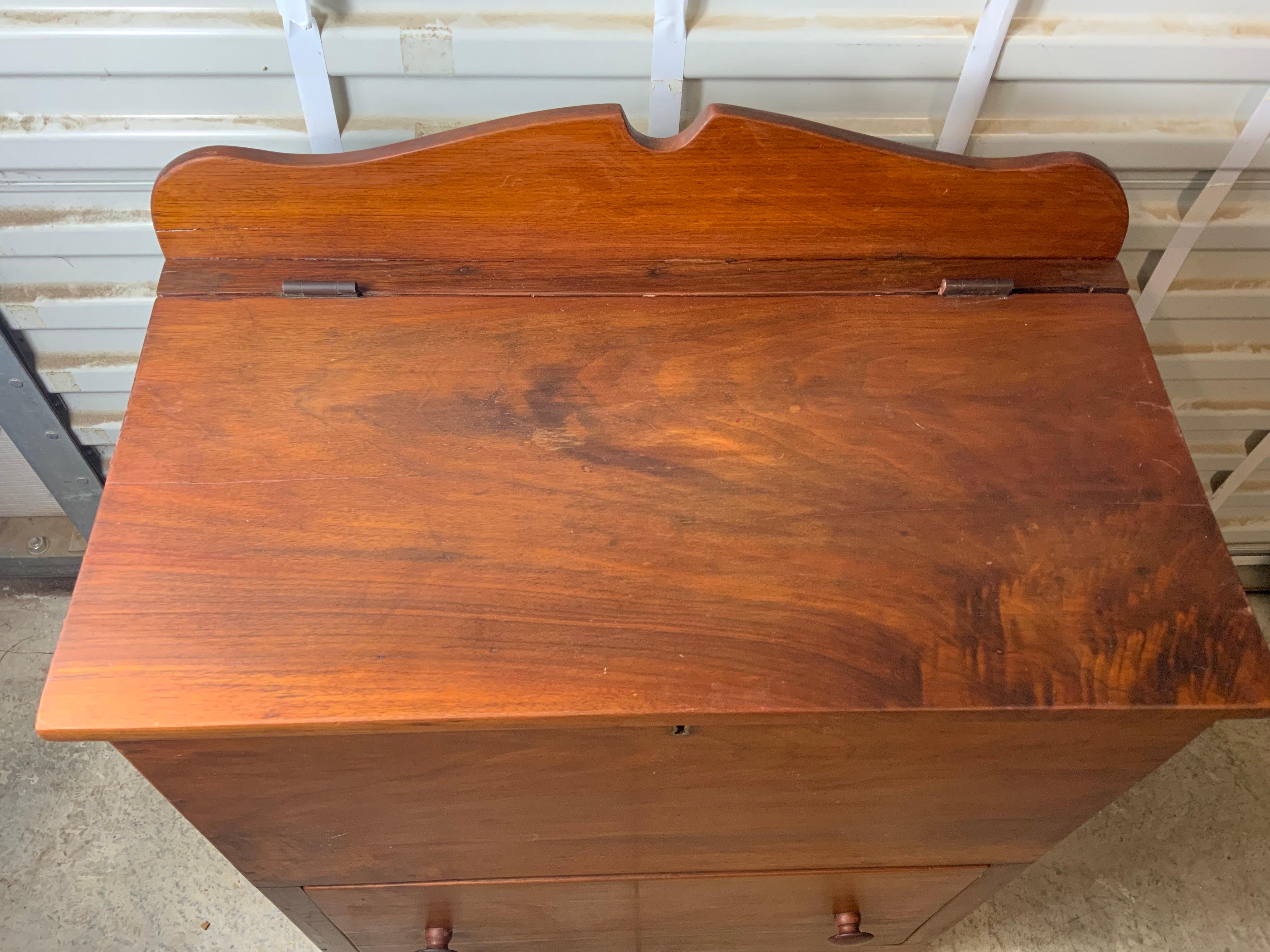 A nice late 19th century southern lift top Chest probably Tennessee or Virginia constructed of Walnut with pine and Poplar as a secondary case wood. The person I purchased it from was from Tennessee and told me her family had always used it as a
