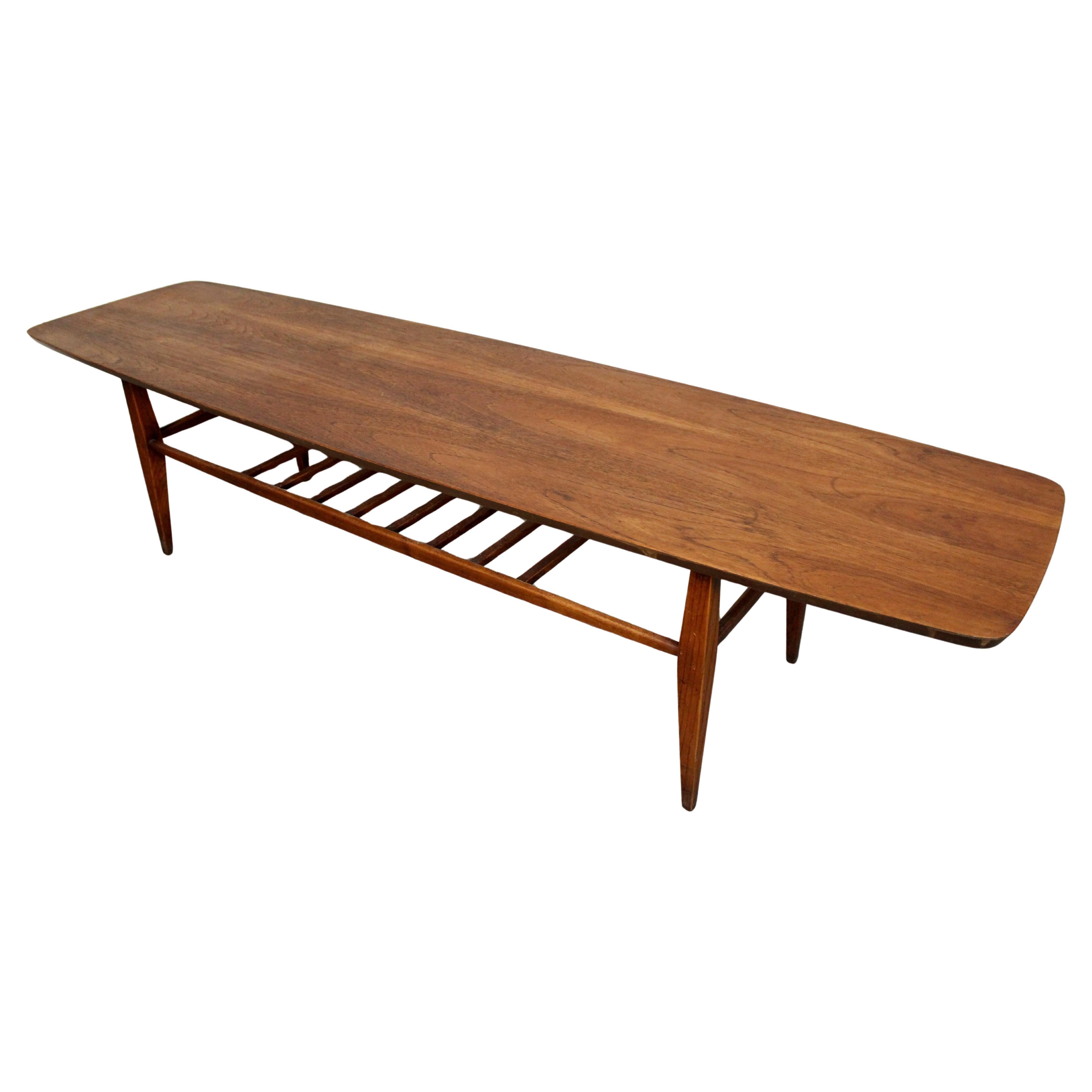 Walnut Surfboard Coffee Table with Spindled Shelf For Sale