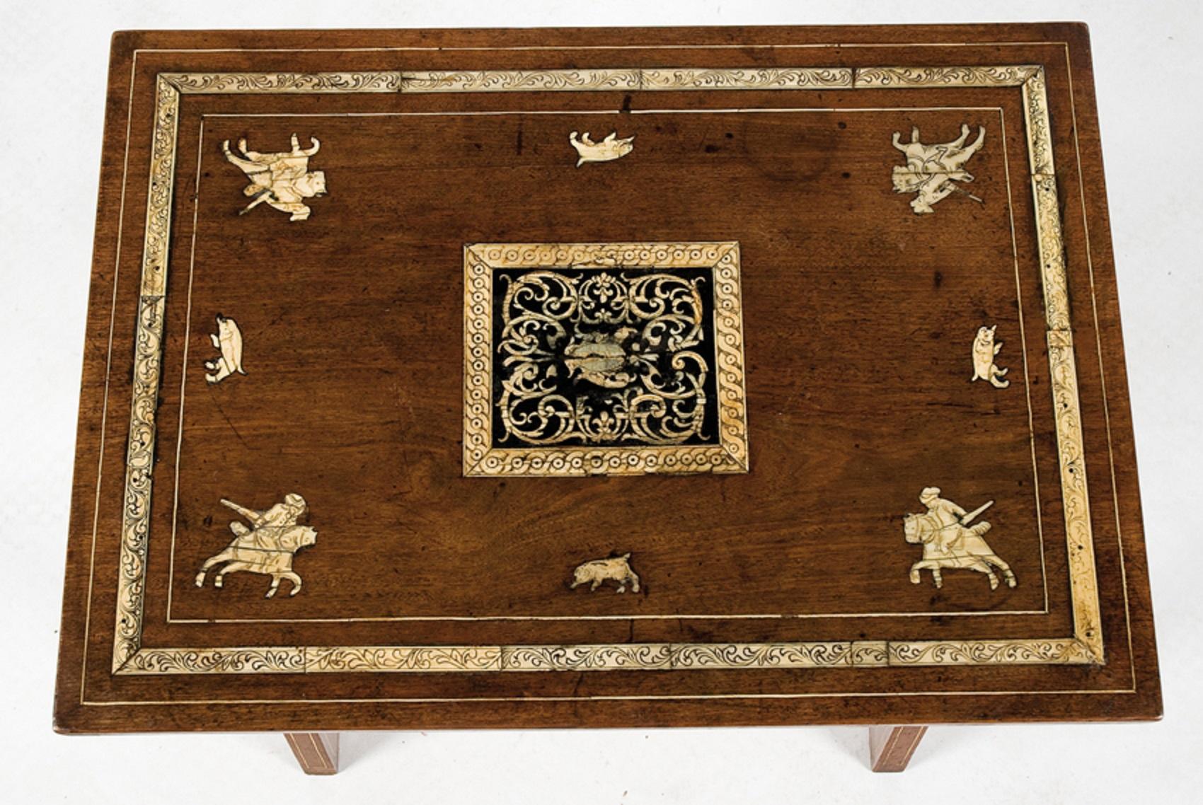 Rectangular tabletop table decorated with inlaid painted figurative and vegetable (hunting riders in the corners and animals alternated around a central roleplaying square) whose legs, of type 