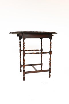 Nido di tavoli alti in noce del 1930 circa