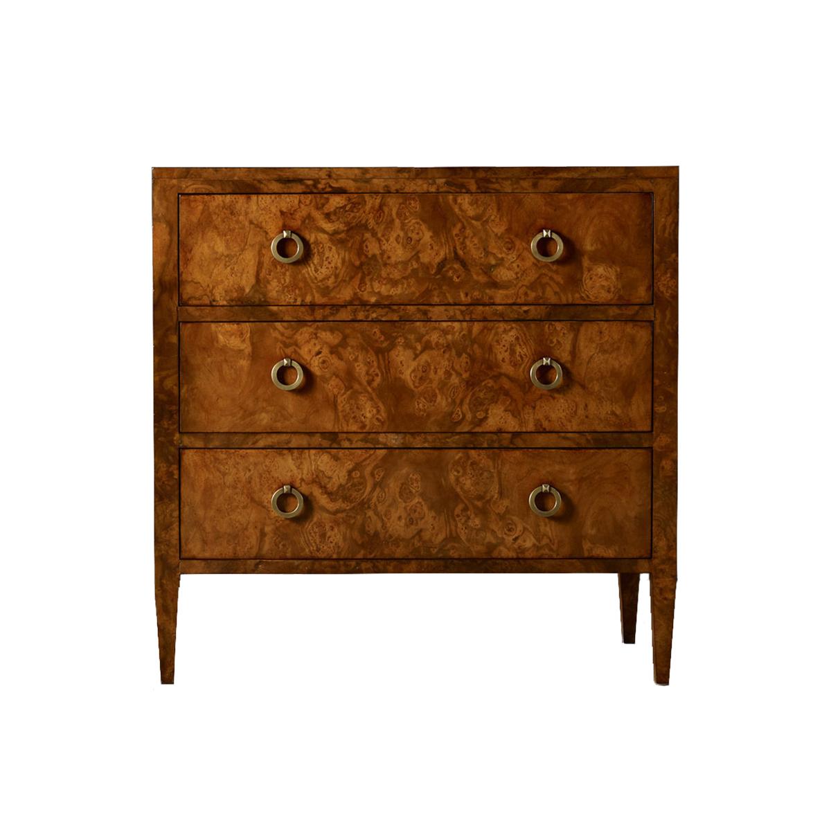 Burl Walnut Three Drawer Chest is a modern dresser with three long drawers and an exotic burl wood veneer. With modern antiqued brass ring pull handles and raised on square tapered legs.

Dimensions: 35