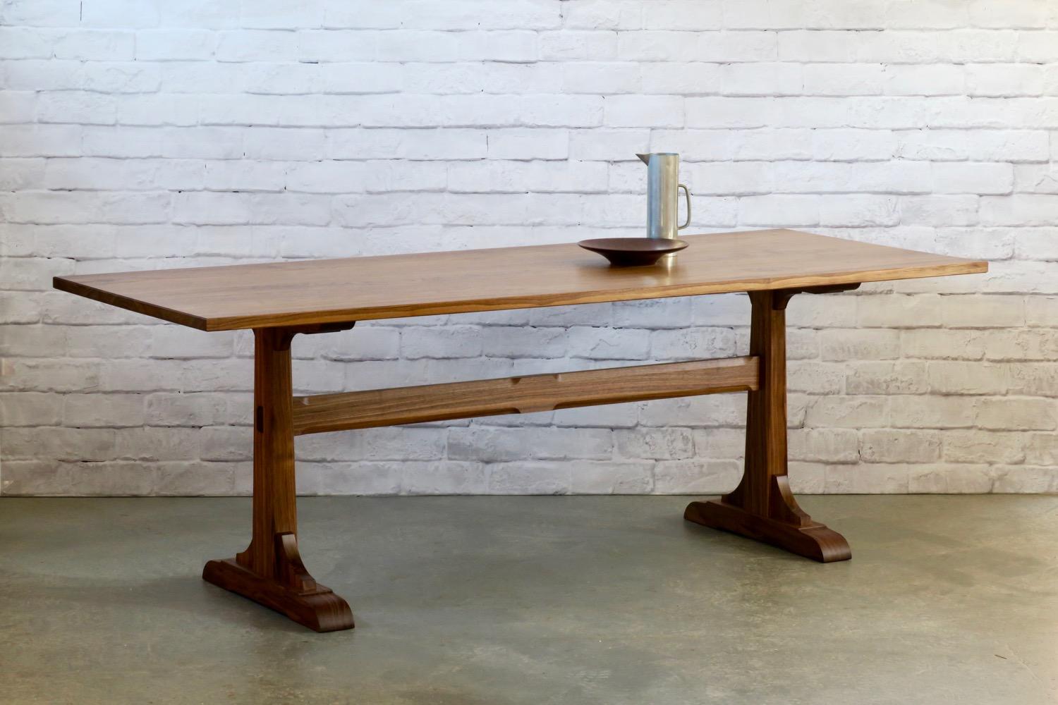 Carved Walnut Trestle Dining Table by Thomas Throop/Black Creek Designs - In Stock For Sale