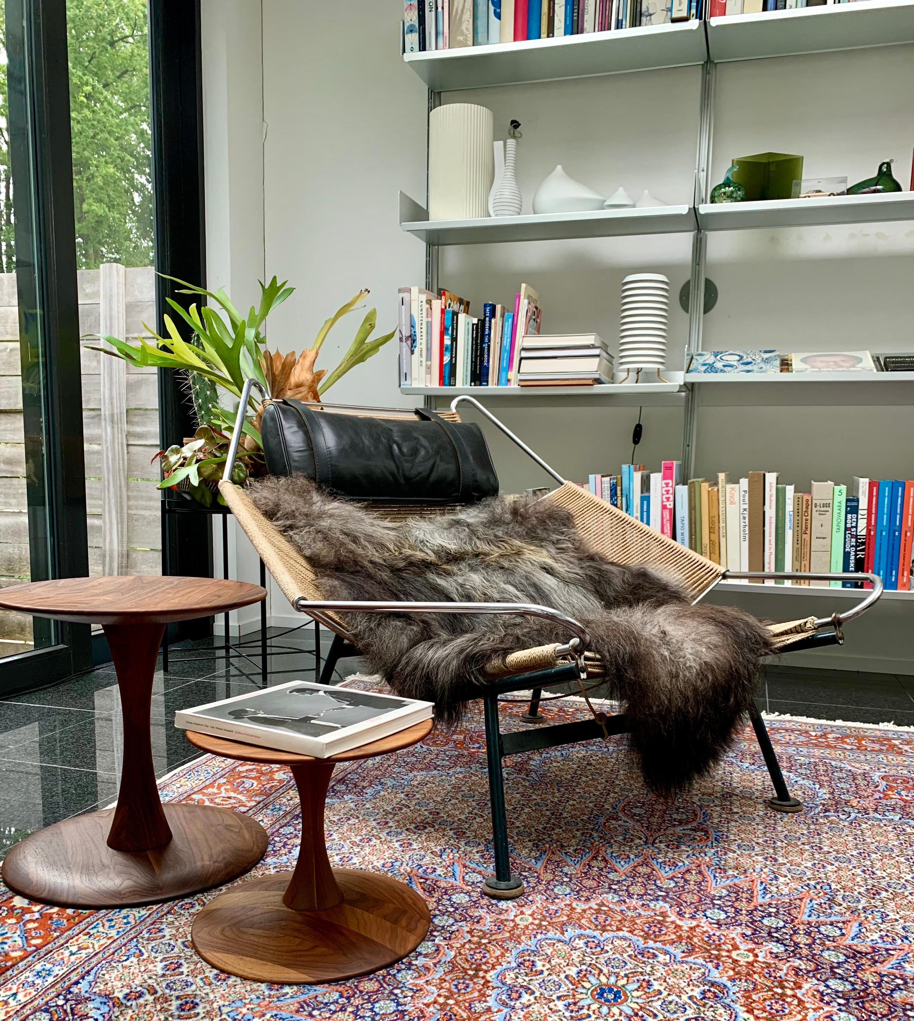 Side table of solid walnut + stool by Nanna Ditzel. The table and stool (commonly used as a small side table) is a versatile lathe-turned solid wooden sculptural piece that come to its own in any interior.

The Toadstool, which Nanna Ditzel