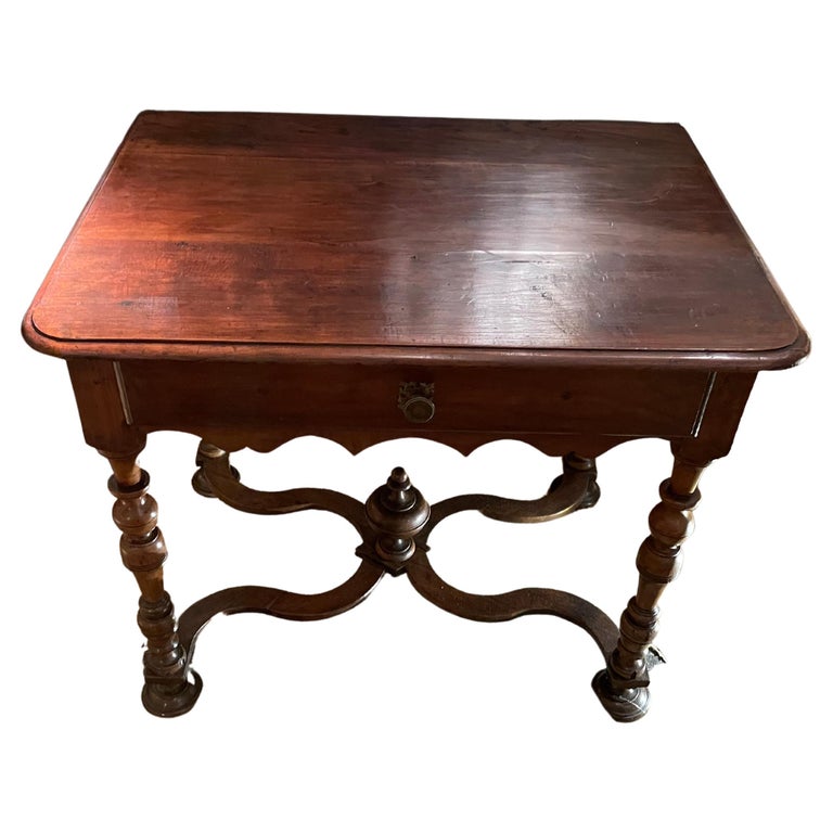 19th century French single center drawer desk.
Decorative finial base at center of curved stretchers.
Turned legs.
Walnut.
Can also be used as a side table.
ARRIVING NOVEMBER