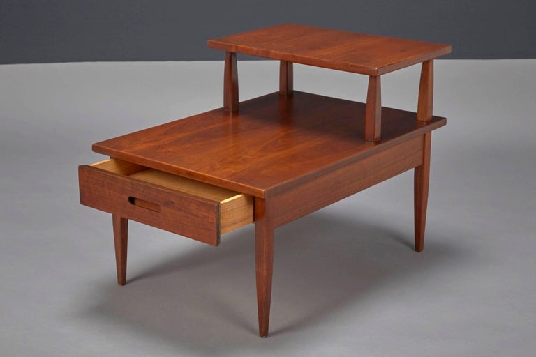 Mid-Century Modern walnut two-tiered side table attributed to T.H. Robsjohn-Gibbings for Widdicomb.