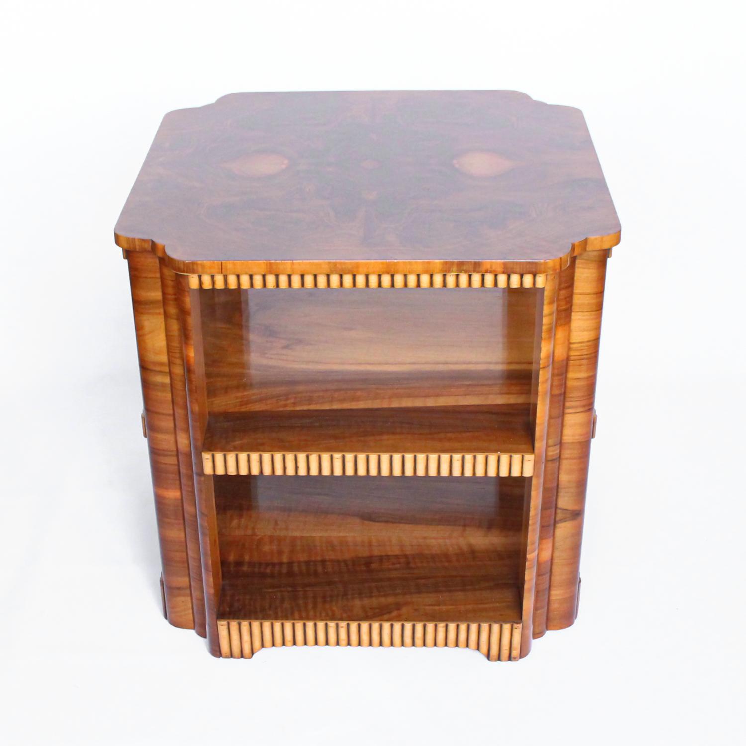 An Art Deco, walnut veneer side table with reed banded decoration throughout.

Origin: England

Date: circa 1935

