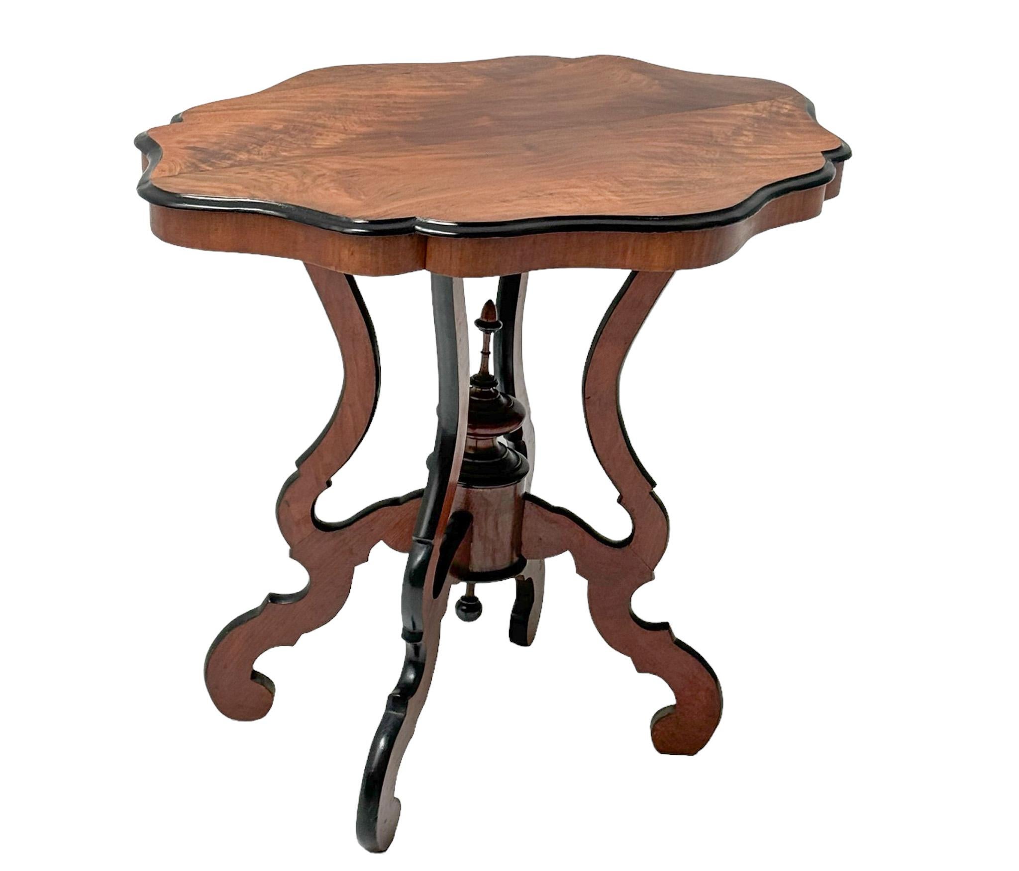 Stunning and elegant Victorian center table.
Striking Dutch design from the 1880s.
Solid walnut base with original walnut veneered top.
The Dutch name for this table is Spinnekop tafel which means Spiderhead table!
This wonderful Victorian center