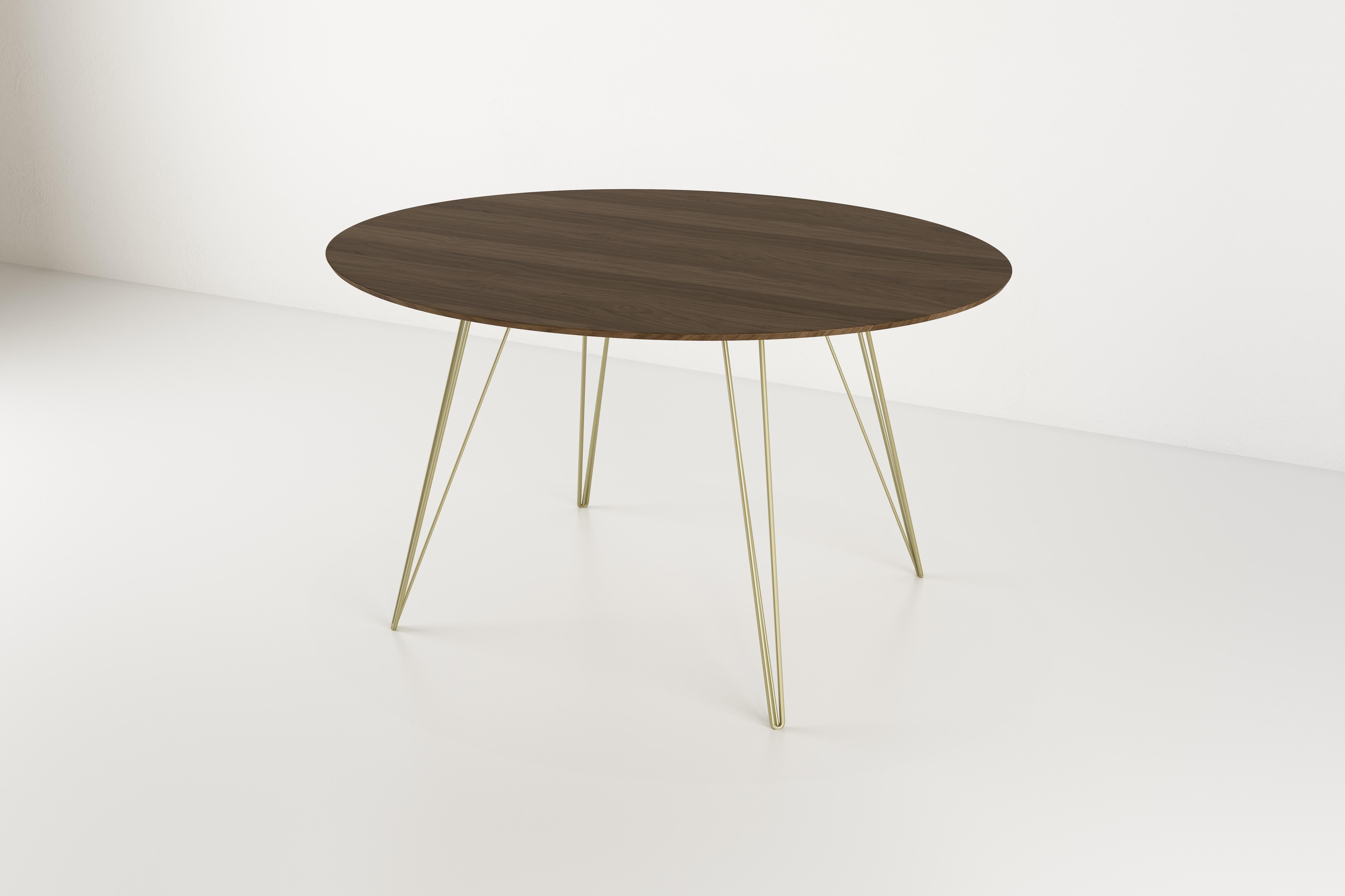 A thin, elegant and light table that can be customized to any shape, size and color desired. This handcrafted item perfectly blends industrial hairpin legs with a beveled wooden top. The irregular beauty of its natural wood combined with its simple