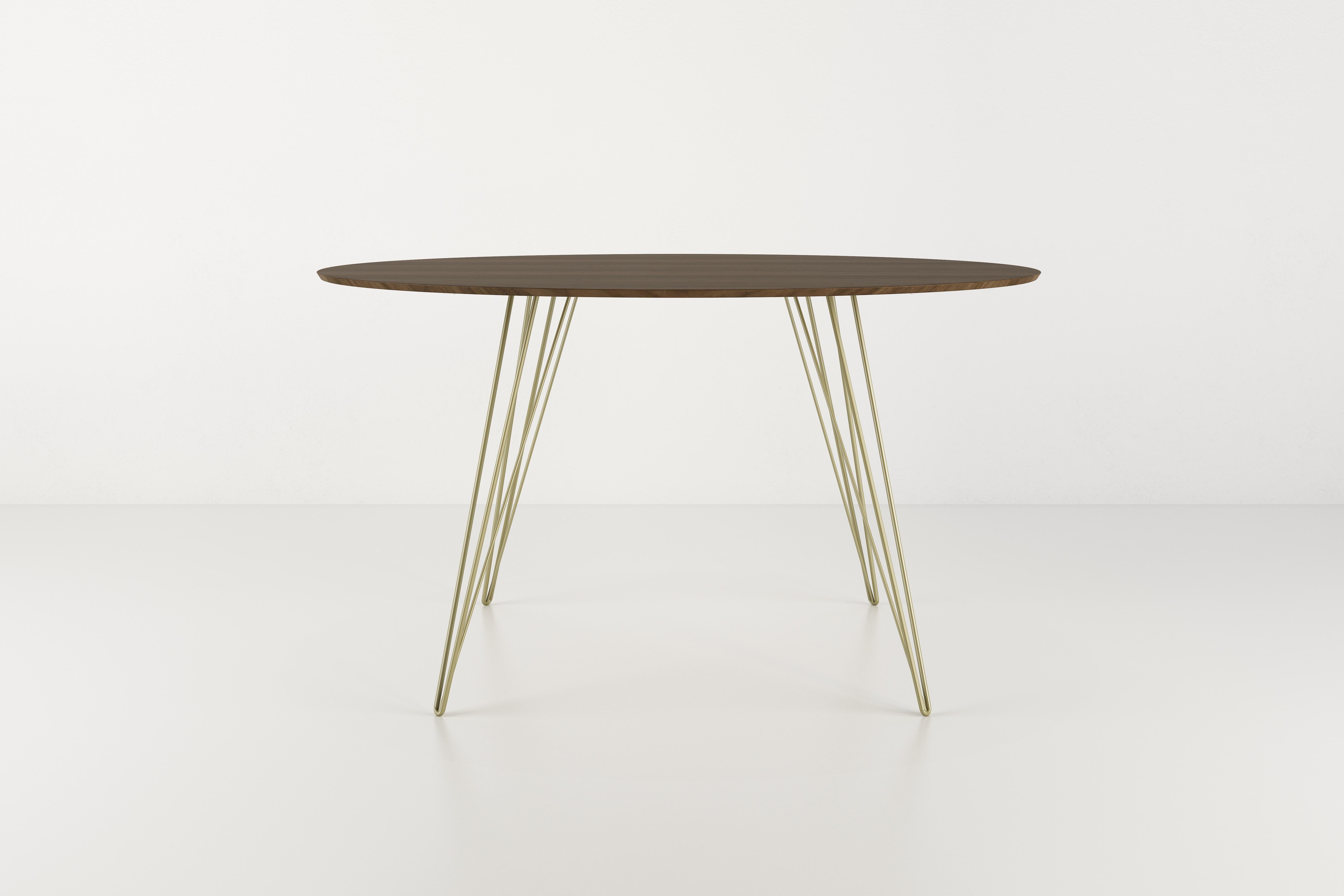 wooden dining table with gold legs