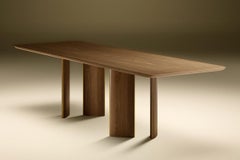 Walnut wood dining table with metal trims by Tatjana von Stein, France