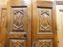 Walnut wood entrance door, carved, double wing, Italy