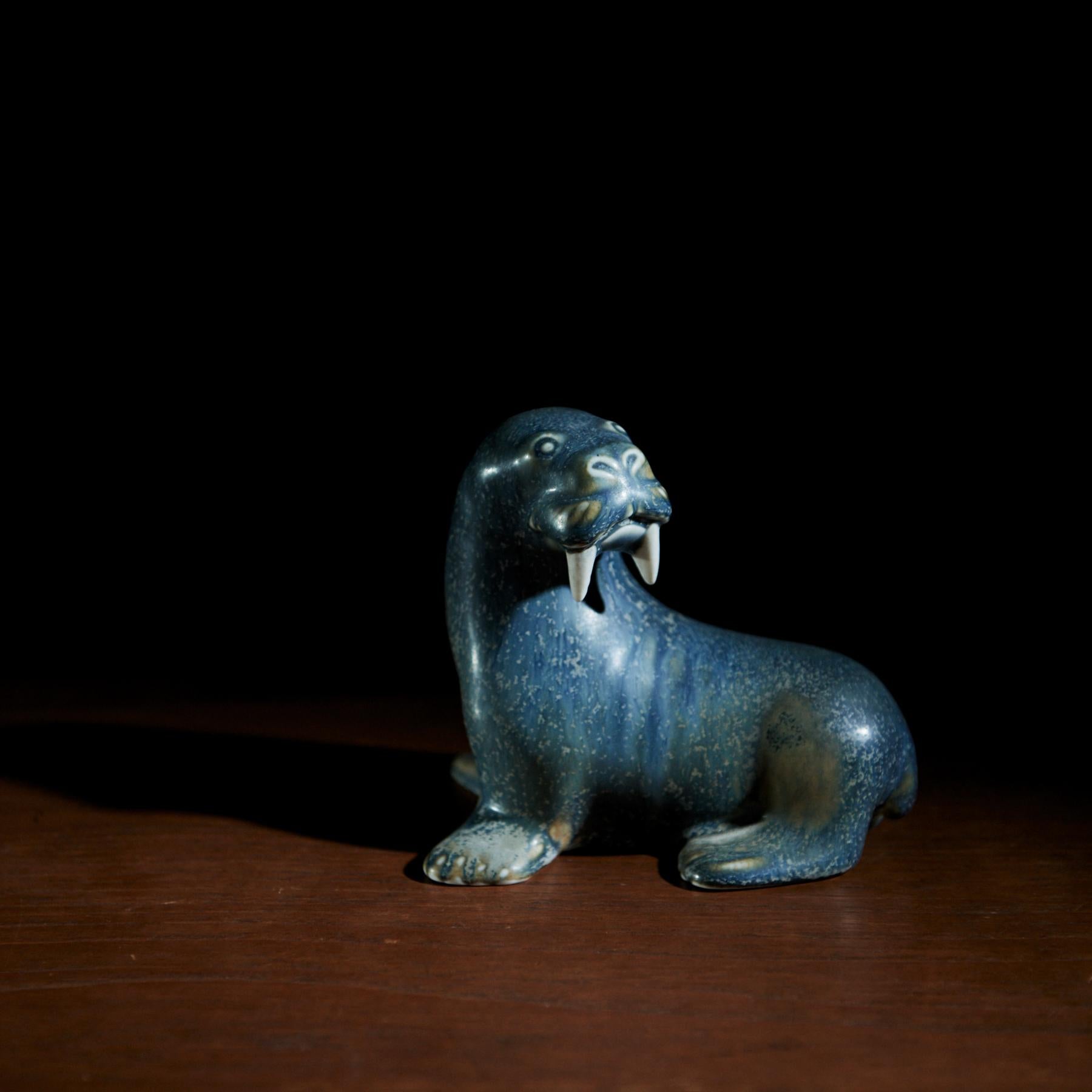 Walrus by Gunnar Nylund
Stoneware figurine from Rörstrand.
Gunnar Nylund became well known for a vast and diversified production of stoneware animal sculptures, which he designed for Rörstrand between the 1930s and 1960s.⁠
