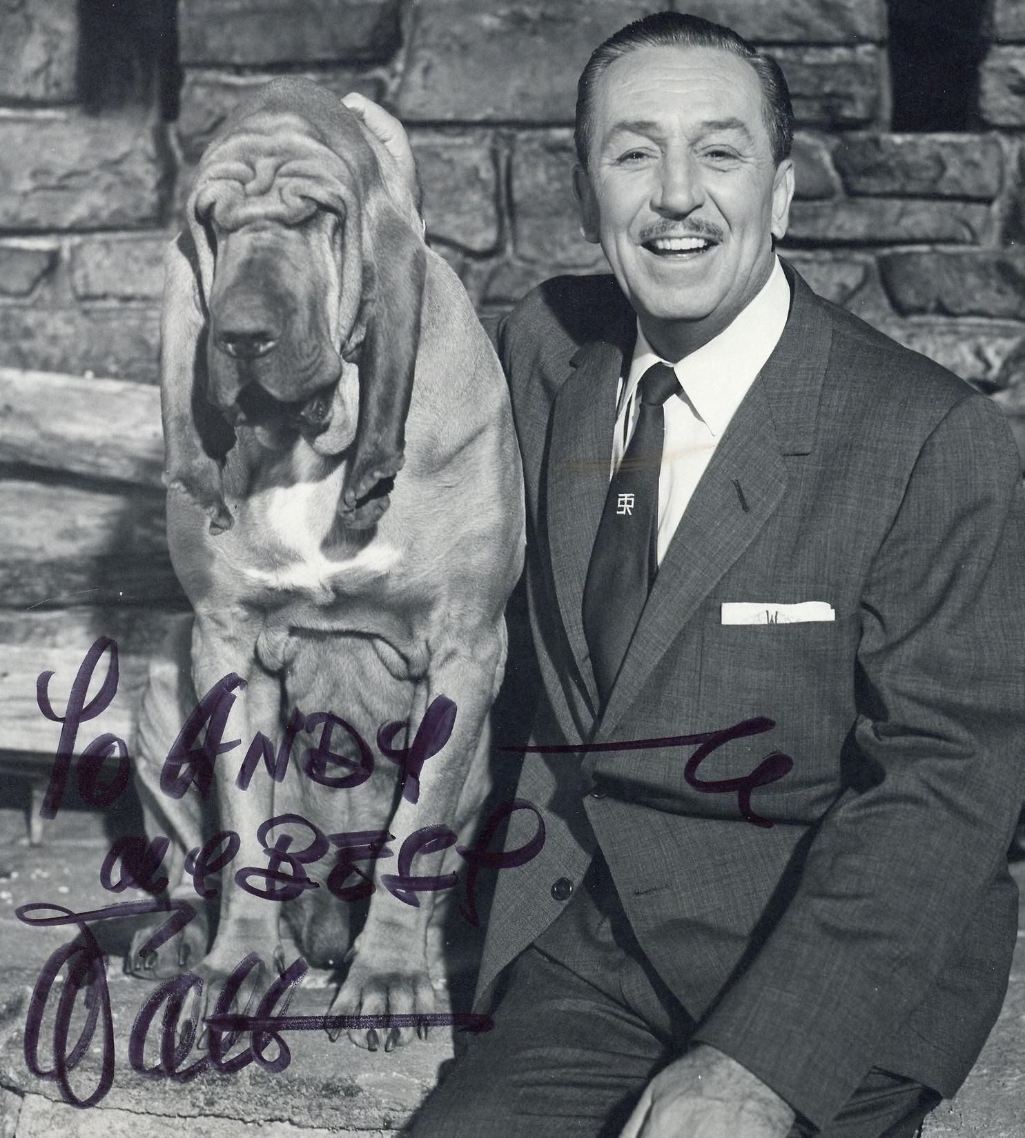- A beautiful black and white photograph signed by one of the 20th century's most important cultural icons

This vintage black and white photograph features Walt Disney seated next to a large dog, and is signed and inscribed 