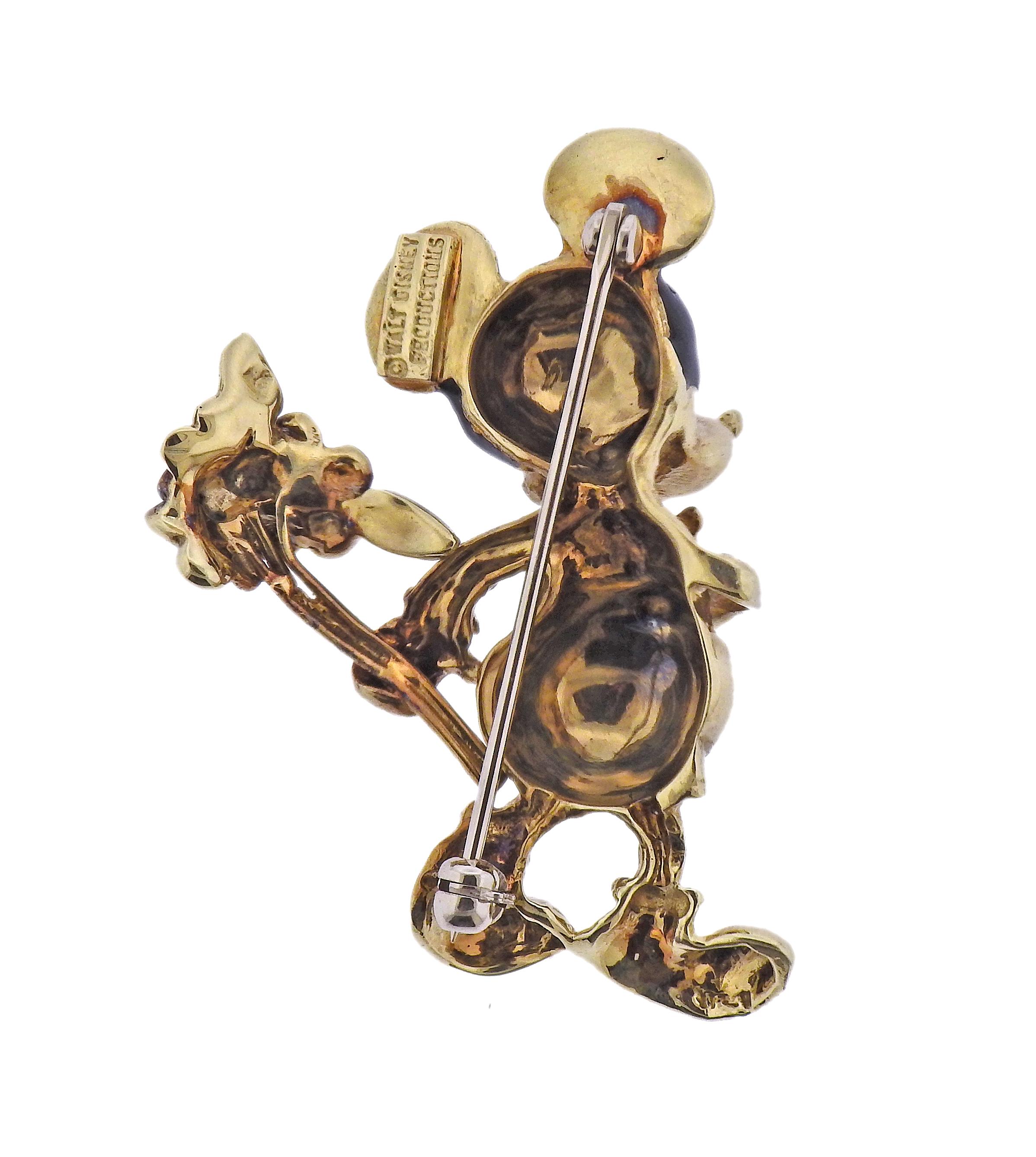 14k yellow gold Walt Disney collectable Mickey Mouse brooch , decorated with enamel. Brooch measures 1.5