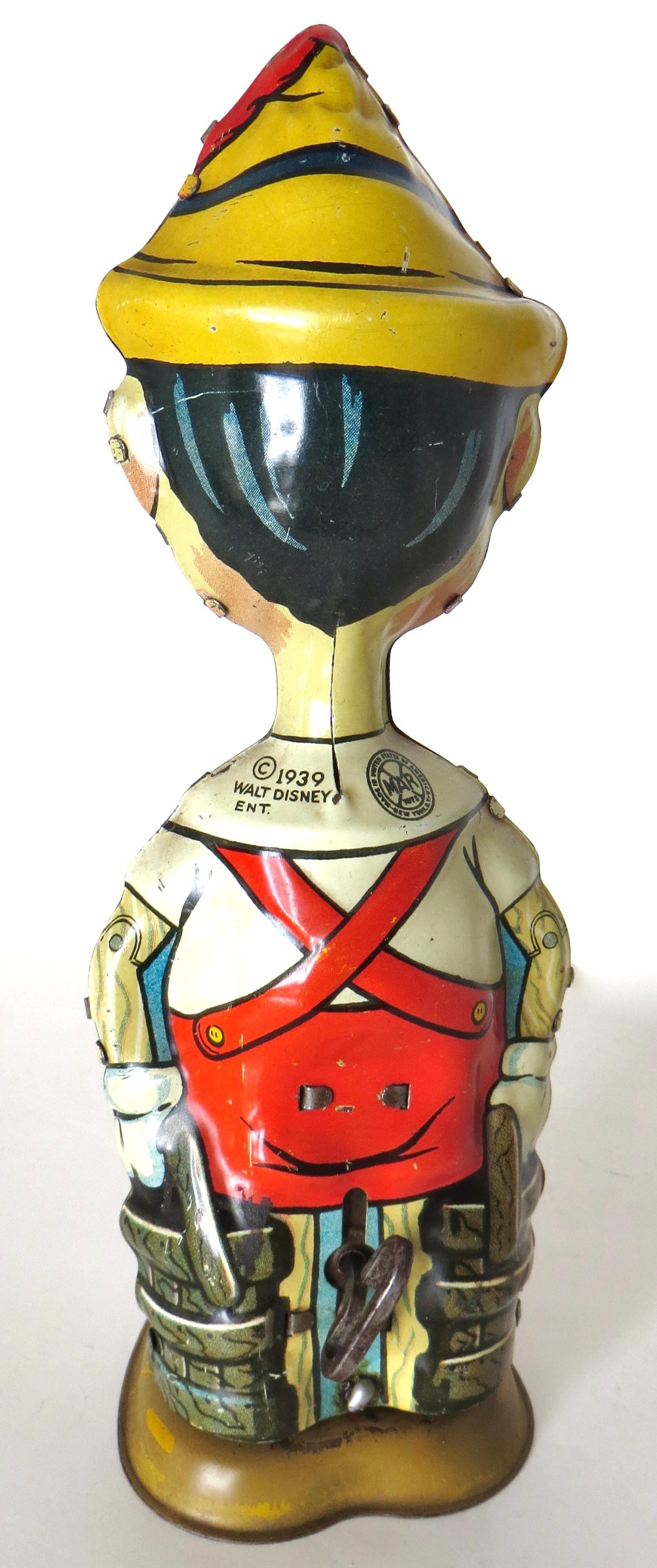Walt Disney Enterprises „Pinocchio“ Wind-Up-Spielzeug von Marx Toy Co., N.Y. Datiert 1939 (Volkskunst) im Angebot