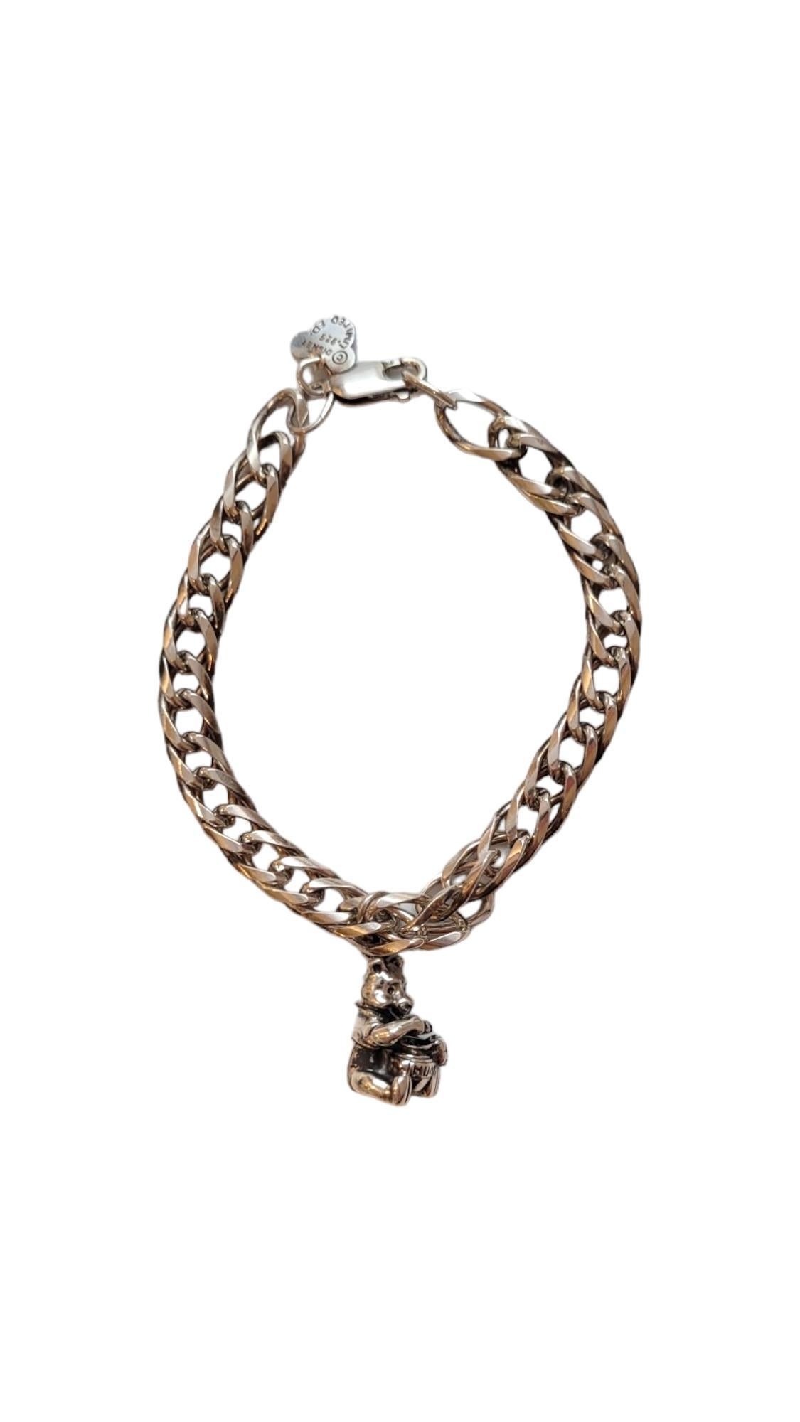 Walt Disney Sterling Silver Bracelet With Winnie The Pooh Charm

This adorable bracelet features Pooh and his iconic honey jar and is a playful addition to your collection. 

Chain Length: 7.5 in X 7.2 in

Weight: 17.0 dwt/ 26.4 g

Hallmark: DISNEY