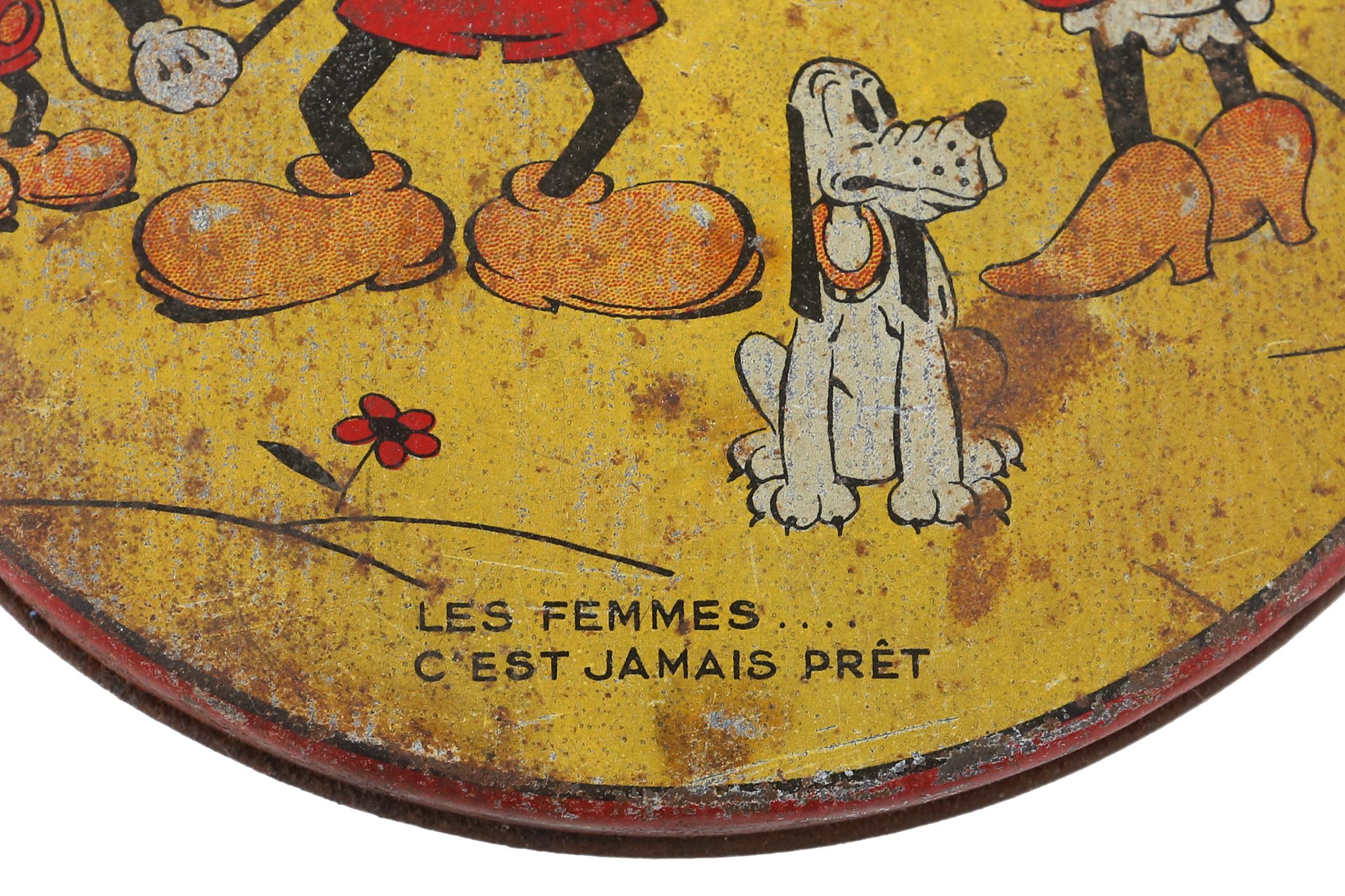 1930s Walt Disney Tin with Mickey Mouse, Minnie Mouse, Pluto and Cat.
This Lithographic yellow round tin has beautiful images with the famous Walt Disney Animation Characters.