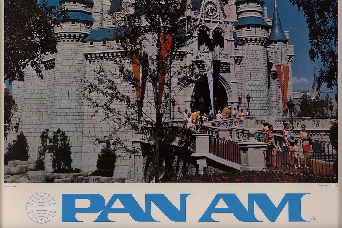 Offered is a vintage travel poster from the airline company Pan American World Airways, or Pan Am. The poster dates to the 1970s and advertises Walt Disney World as one of their alluring destinations. The poster features the Cinderella castle