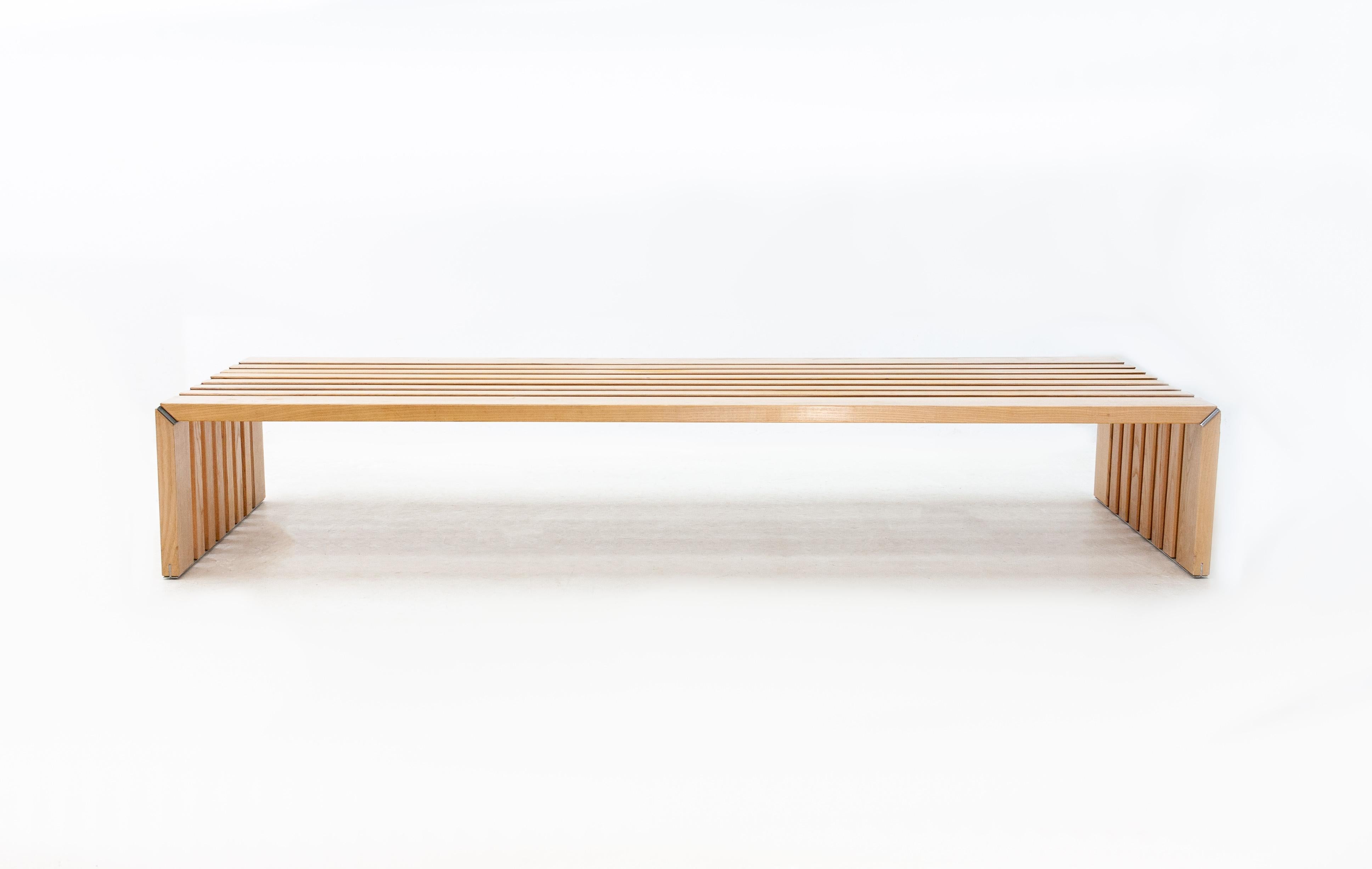 Rare slat bench (180 cm) of the ‘Passe Partout’ serie designed by Walter Antonis for Arspect (NL) 1974-1986.This item can be used as a bench or table. Some patina on the solid oak White wash wood (original condition), but overall in nice