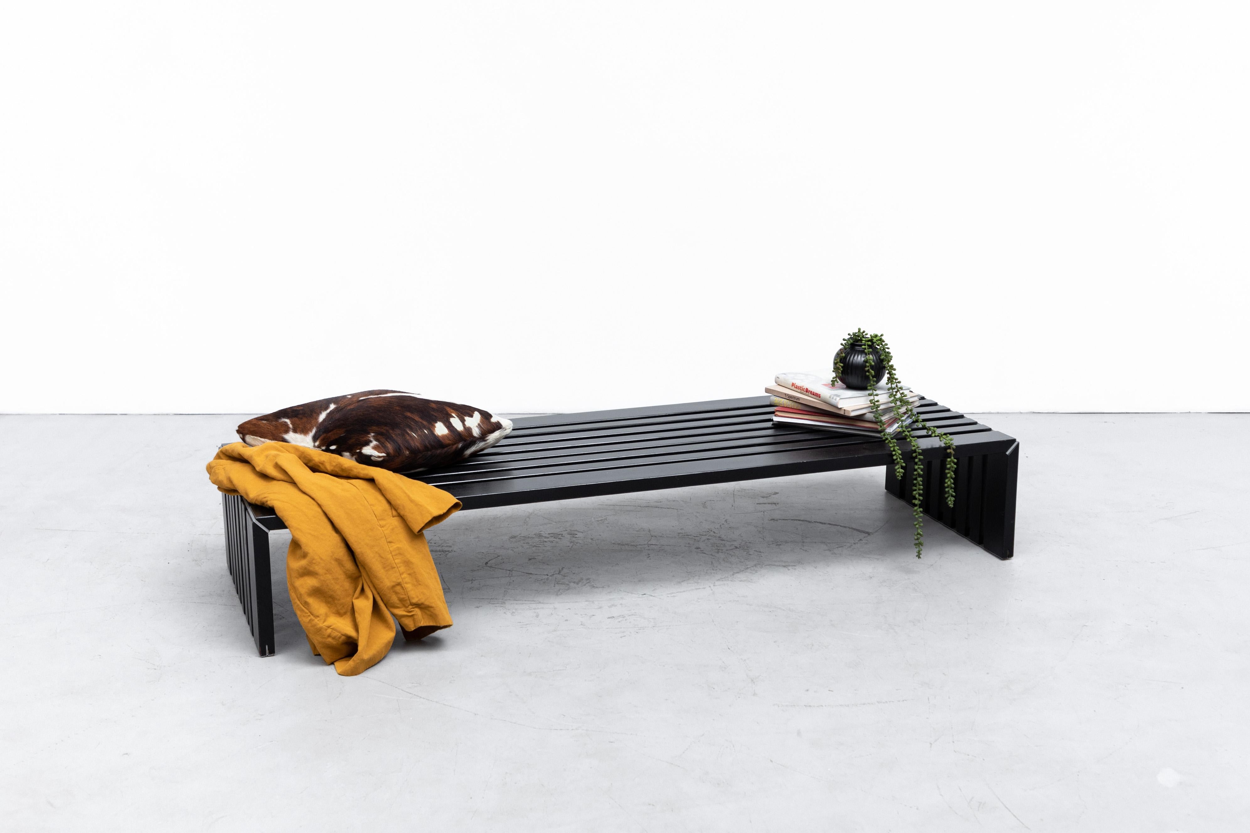 Walter Antonis 'Passe Partout' slat bench with black stained wood slats and steel support accents. Lightly refinished with light wear consistent with age and use. Another one also available in natural ash (LU922424105502). Listed separately.
