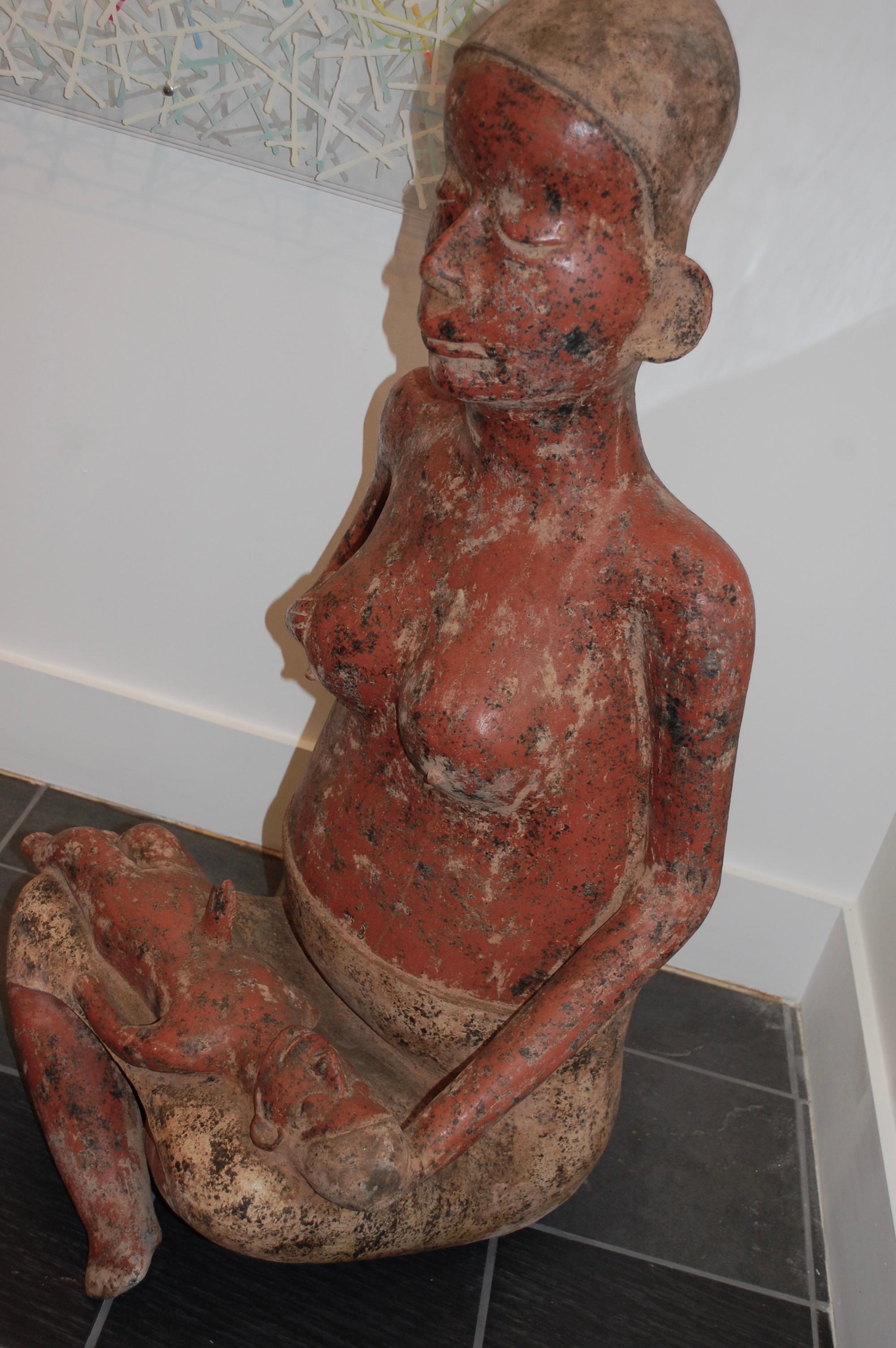  Seated Mother And Child, 
Modern Pre Columbian style large sculpture edition 1/30, artist signed. 
Walter Bastianetto is an Italian born sculptor who moved to Mexico in the 1970s and resided there. Well-known artist for his original clay,