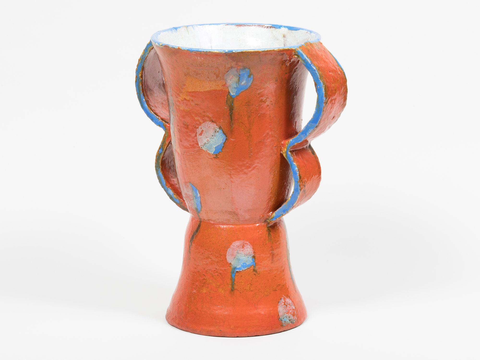 Large orange glazed vase by Austrian artist Walter Bosse, possibly for Goldscheider of Vienna, circa 1920s. Among the largest and best surviving Bosse vases we've ever seen. Featuring double handles, a pedestal base, and a hand-painted design in