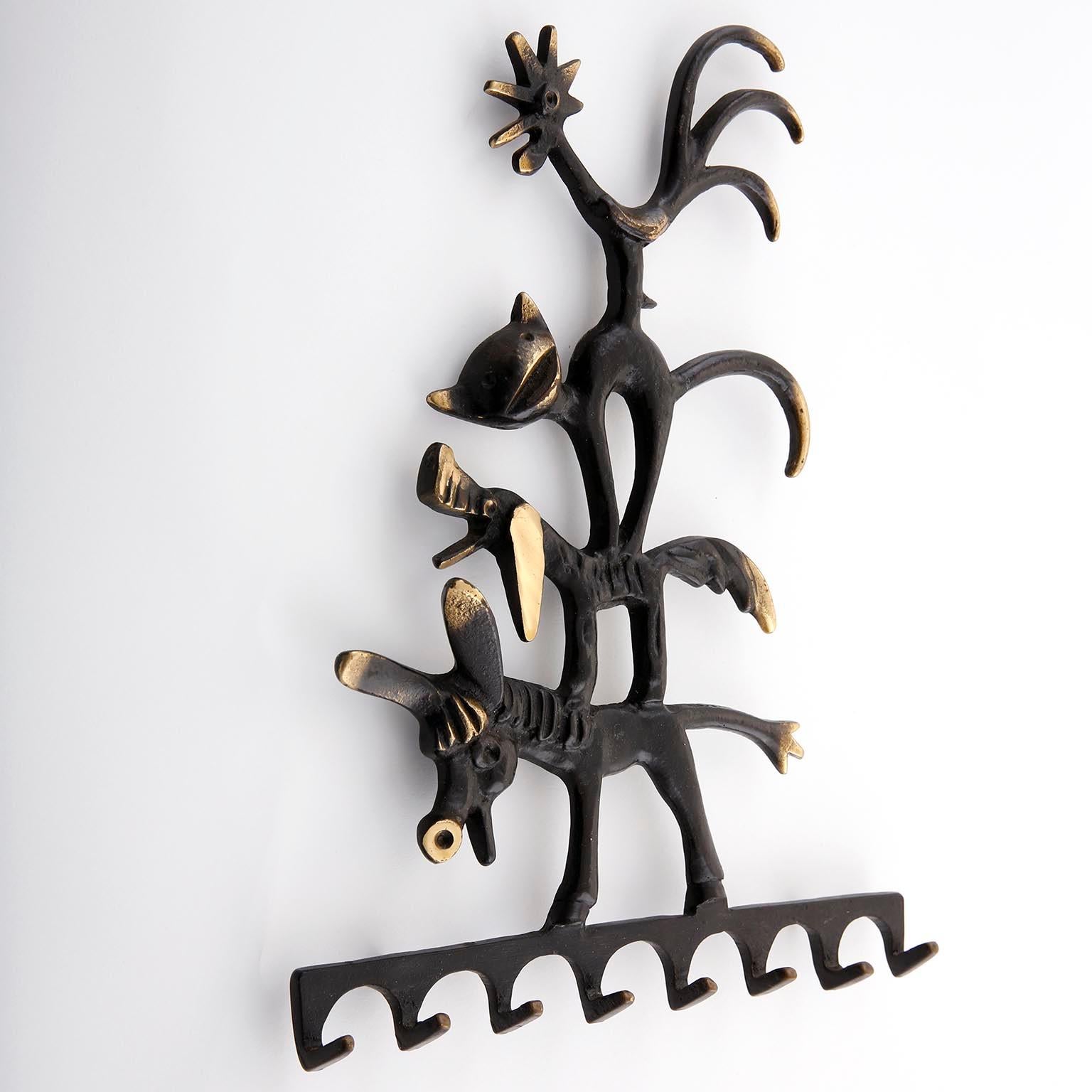 A key hanger made of made of blackened and polished brass by Walter Bosse and manufactured by Hertha Baller, Austria, Vienna, in midcentury in 1950s.
This key holder was inspired by the German myth 'Bremer Stadtmusikanten' (engl. 'Town Musicians of