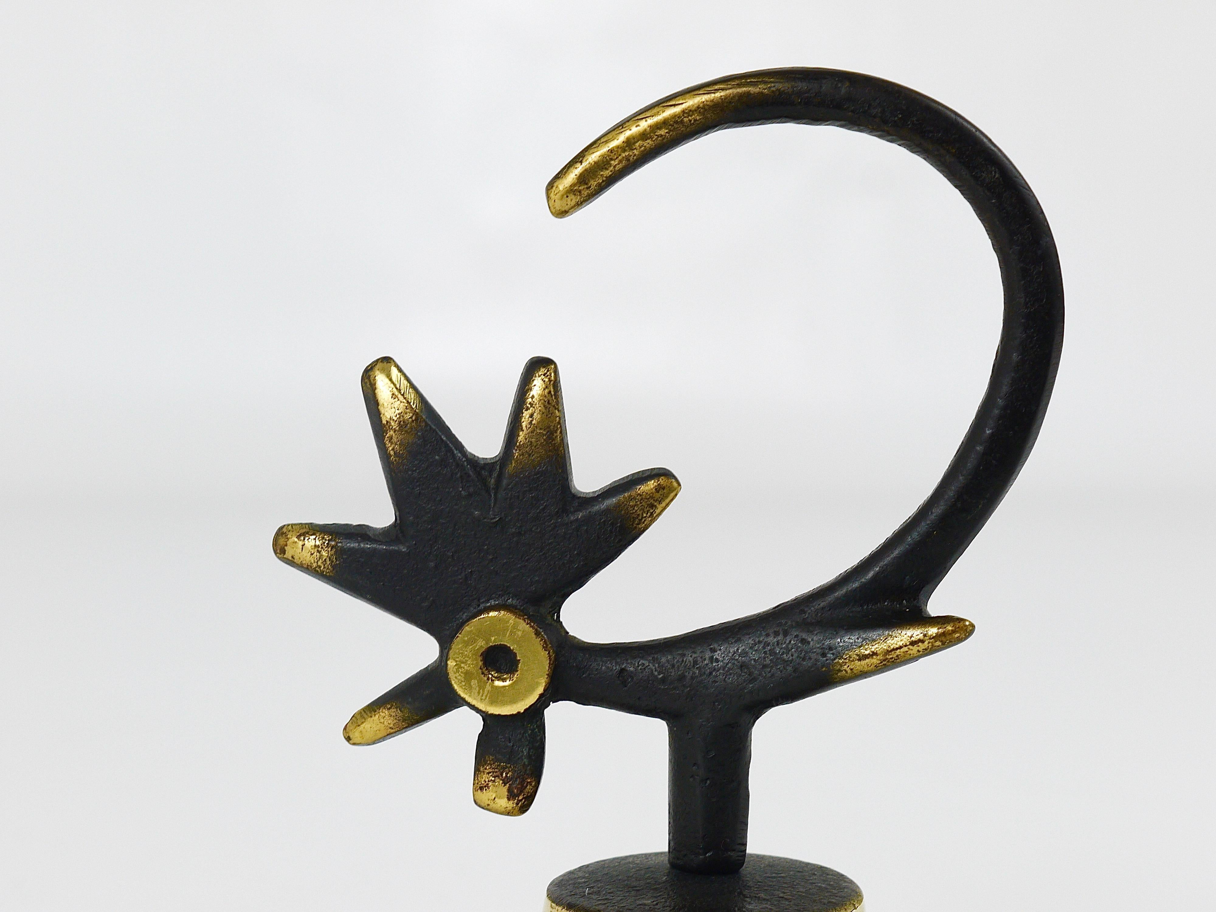 A charming midcentury table bell displaying a cock. A very humorous design by Walter Bosse, executed by Herta Baller Austria in the 1950s. Made of brass, in very good condition.