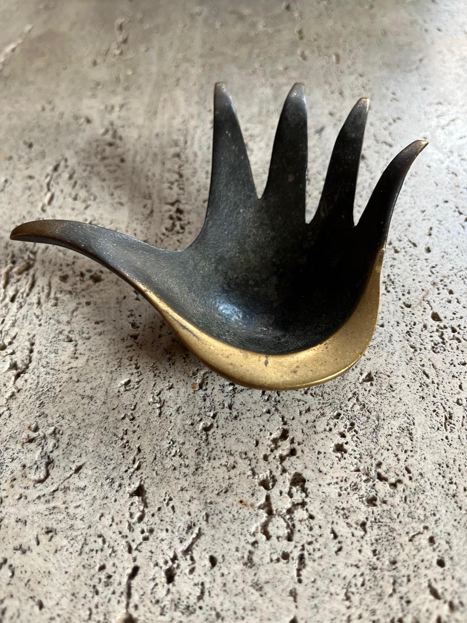 A very good early example of a hand shaped bronze vide poche by the Austrian designer Walter Bosse for Herta Balla.