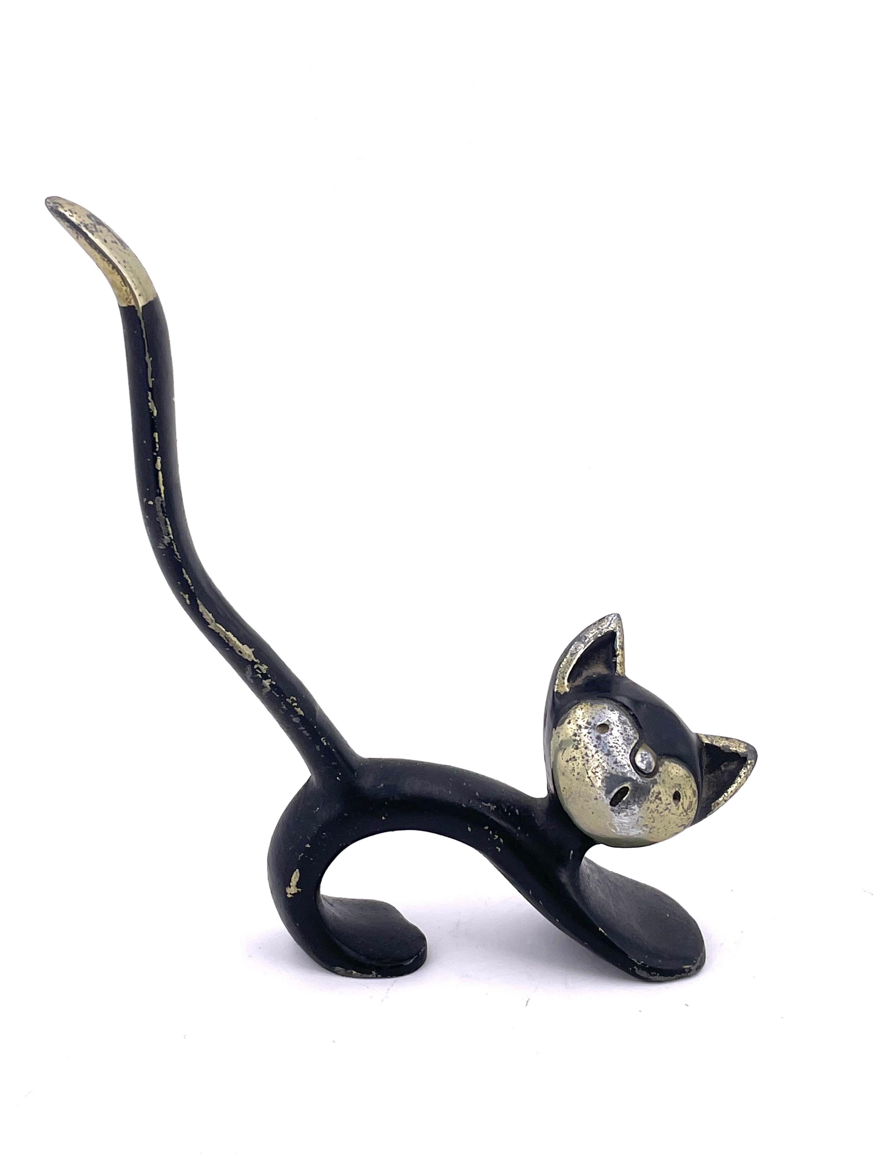 Rare Walter Bosse cat ring holder circa 1950's nicely patinated, some brass left from the original finish some scratches and painting it's off as shown.