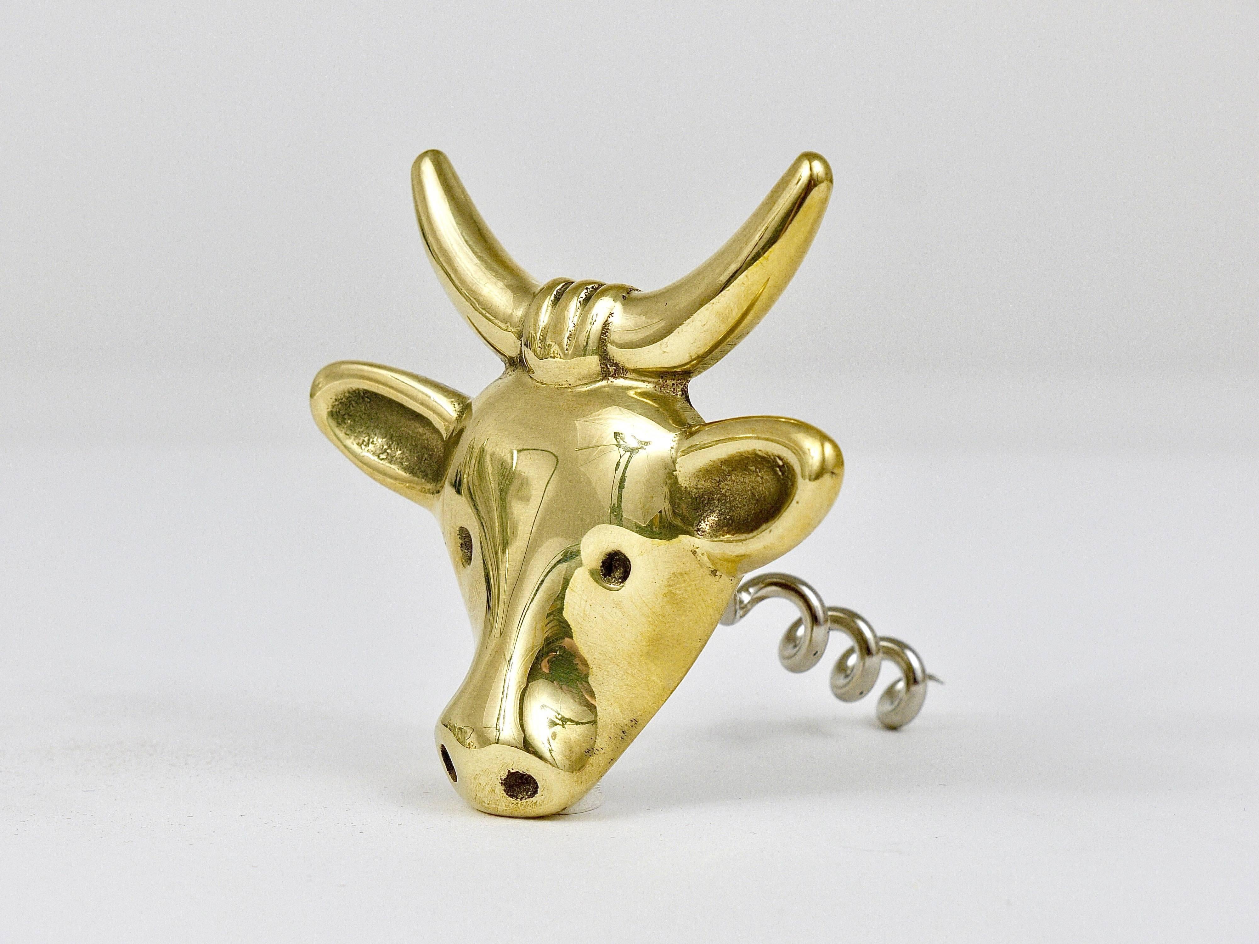 A charming midcentury bottle opener/cork screw, displaying a cow. A very humorous design by Walter Bosse, executed by Herta Baller Austria in the 1950s. Made of polished brass, in very good condition.