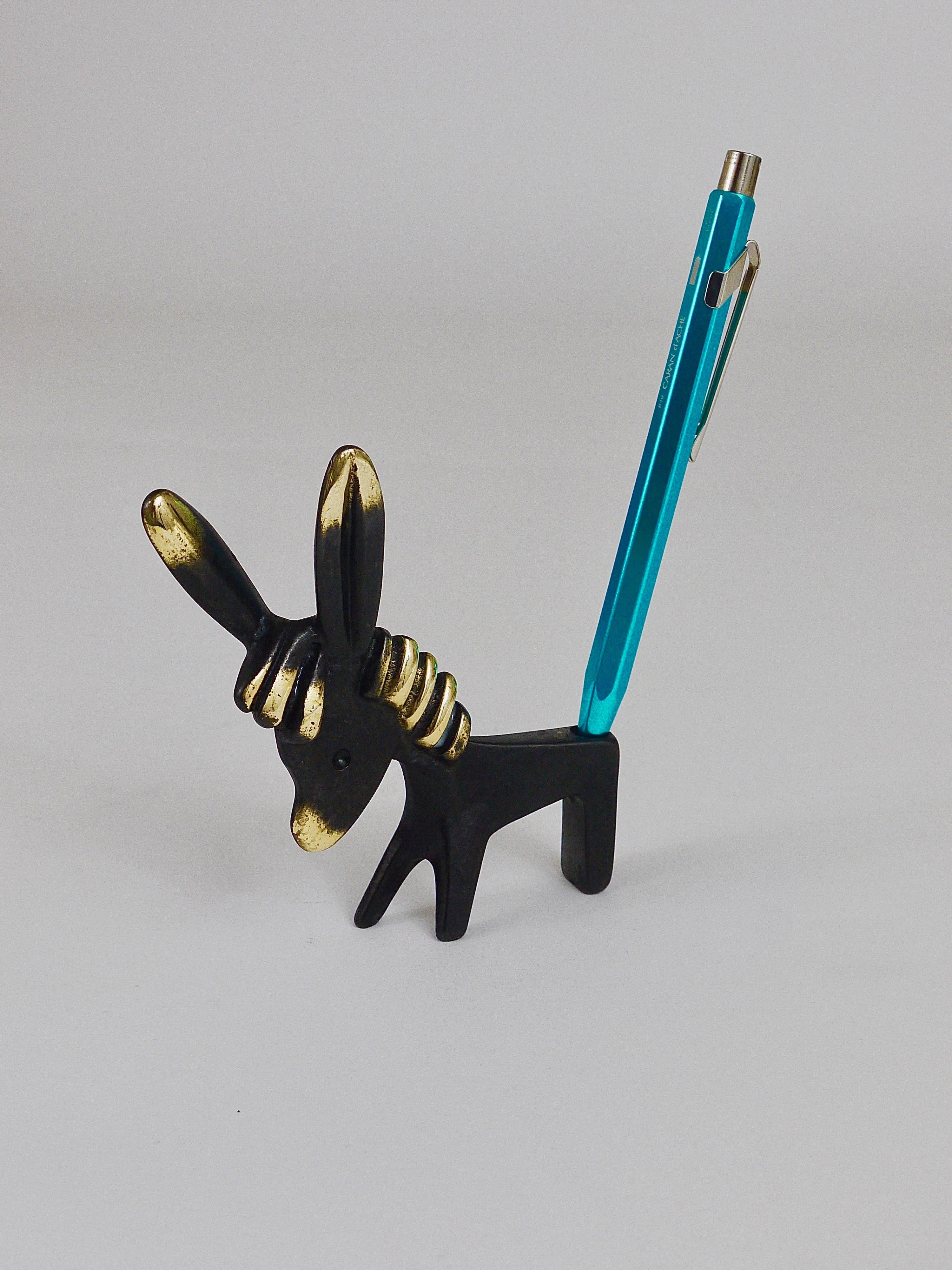 A very charming Austrian midcentury pen or pencil holder, displaying a donkey. A very humorous design by Walter Bosse executed by Herta Baller Austria in the 1950s. Made of brass in excellent condition.
