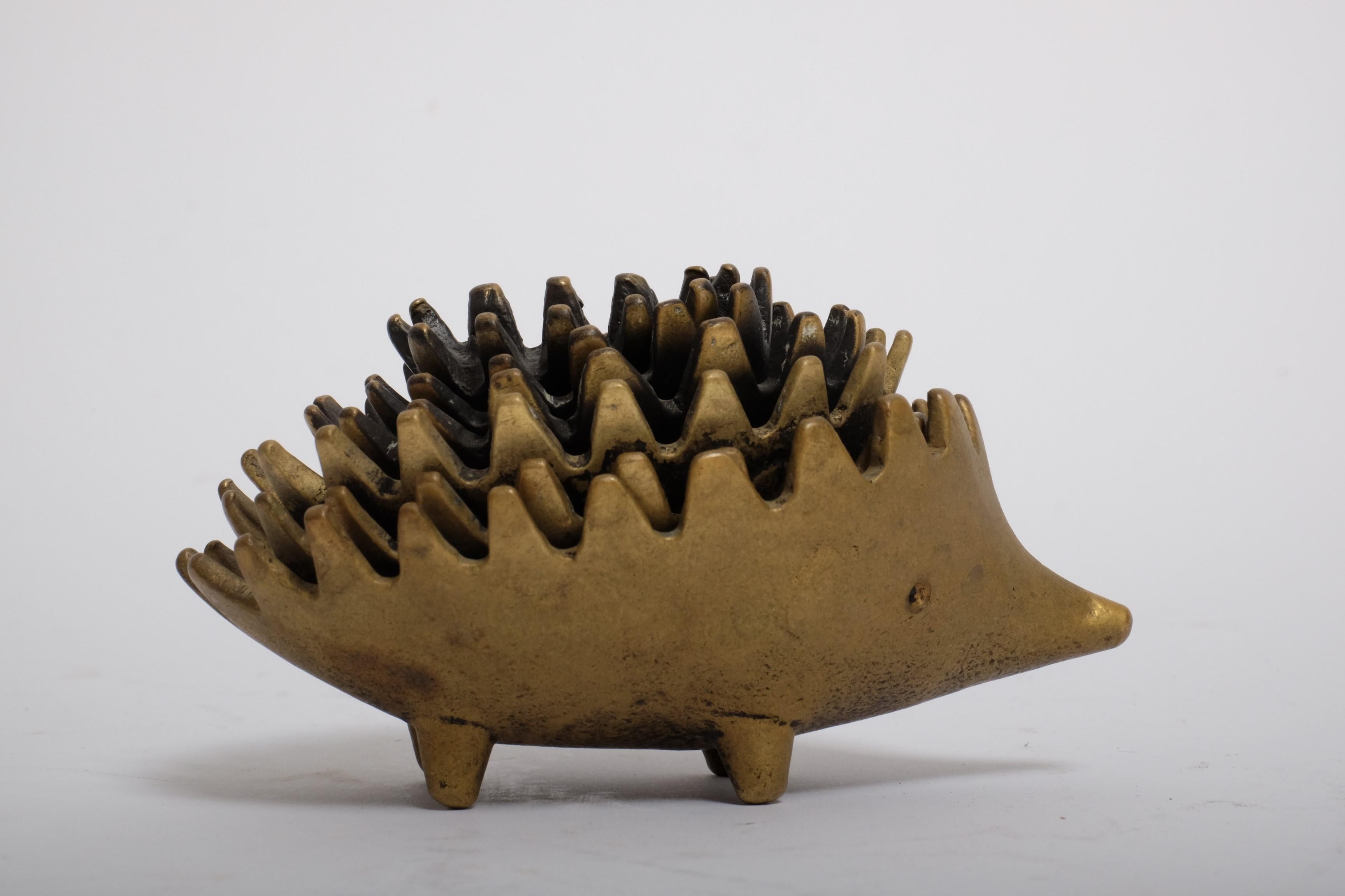 A complete set of six stackable mid-century hedgehog ashtrays.

Design by Walter Bosse. Executed by Hertha Baller, Austria in the 1950s.

Made from brass. Version with three light and three dark hedgehogs.

In good condition with nice patina.