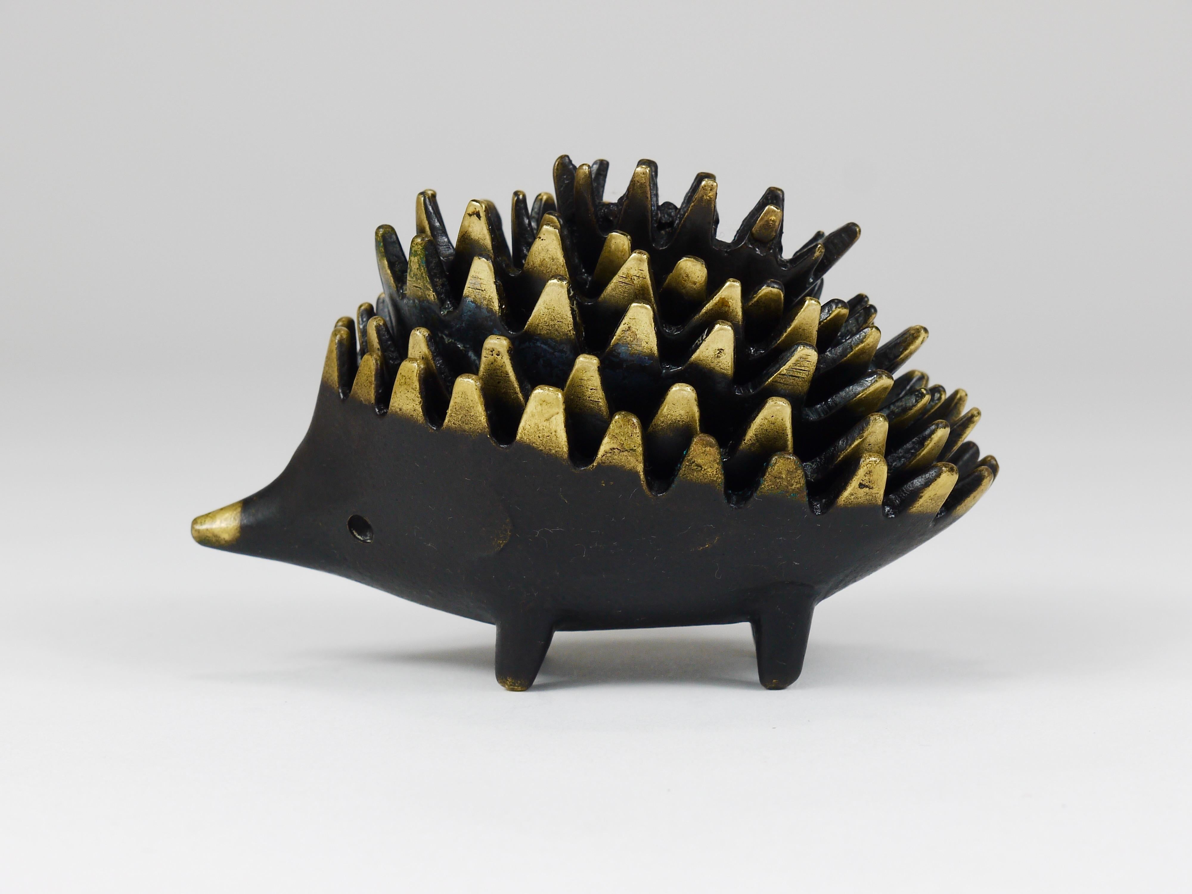 A complete set of six vintage stackable midcentury hedgehog ashtrays. A humorous and charming design by Walter Bosse, executed in the 1950s by Hertha Baller, Austria. Made of brass, in good condition with nice patina.