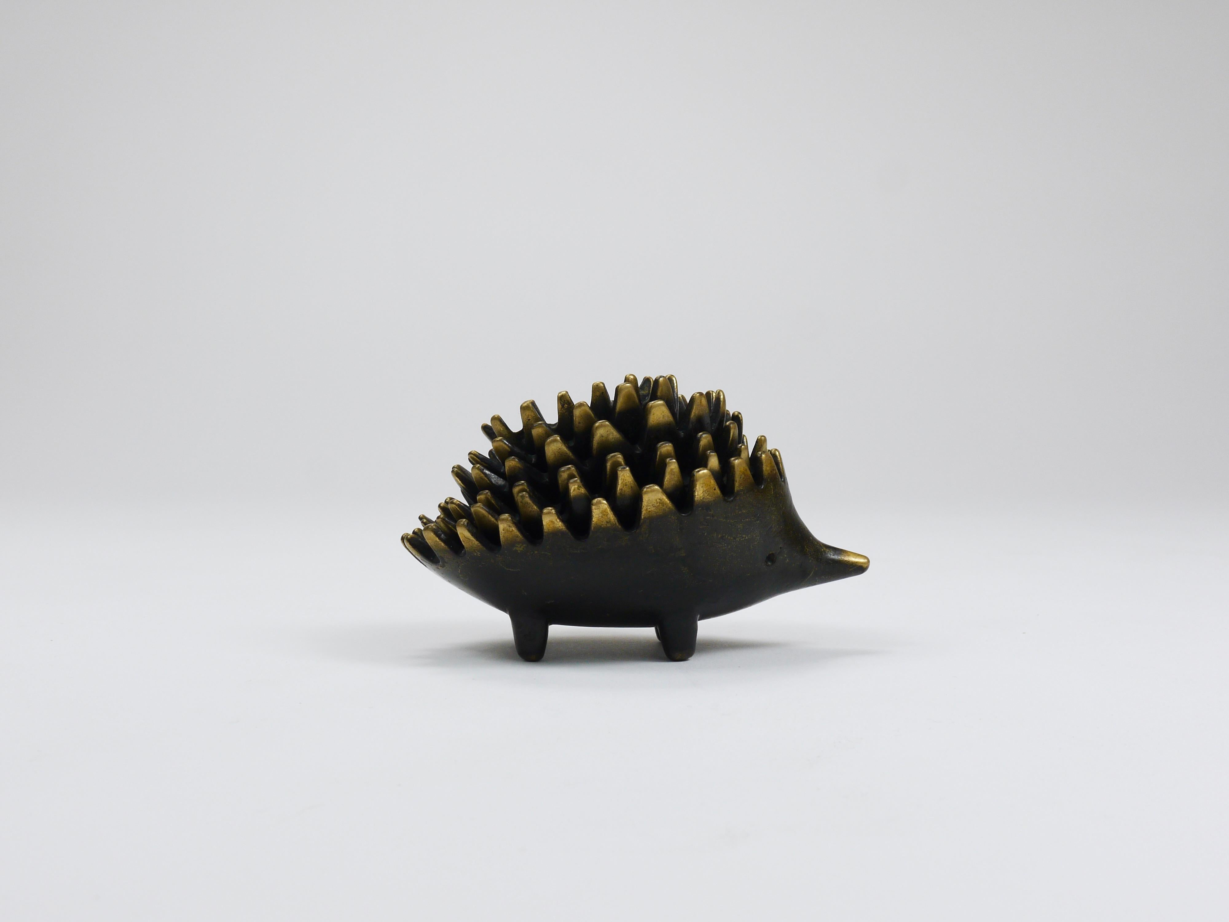 A complete set of six vintage stackable midcentury hedgehog ashtrays. A humorous and charming design by Walter Bosse, executed in the 1950s by Hertha Baller, Austria. Made of solid brass, in good condition with nice patina.