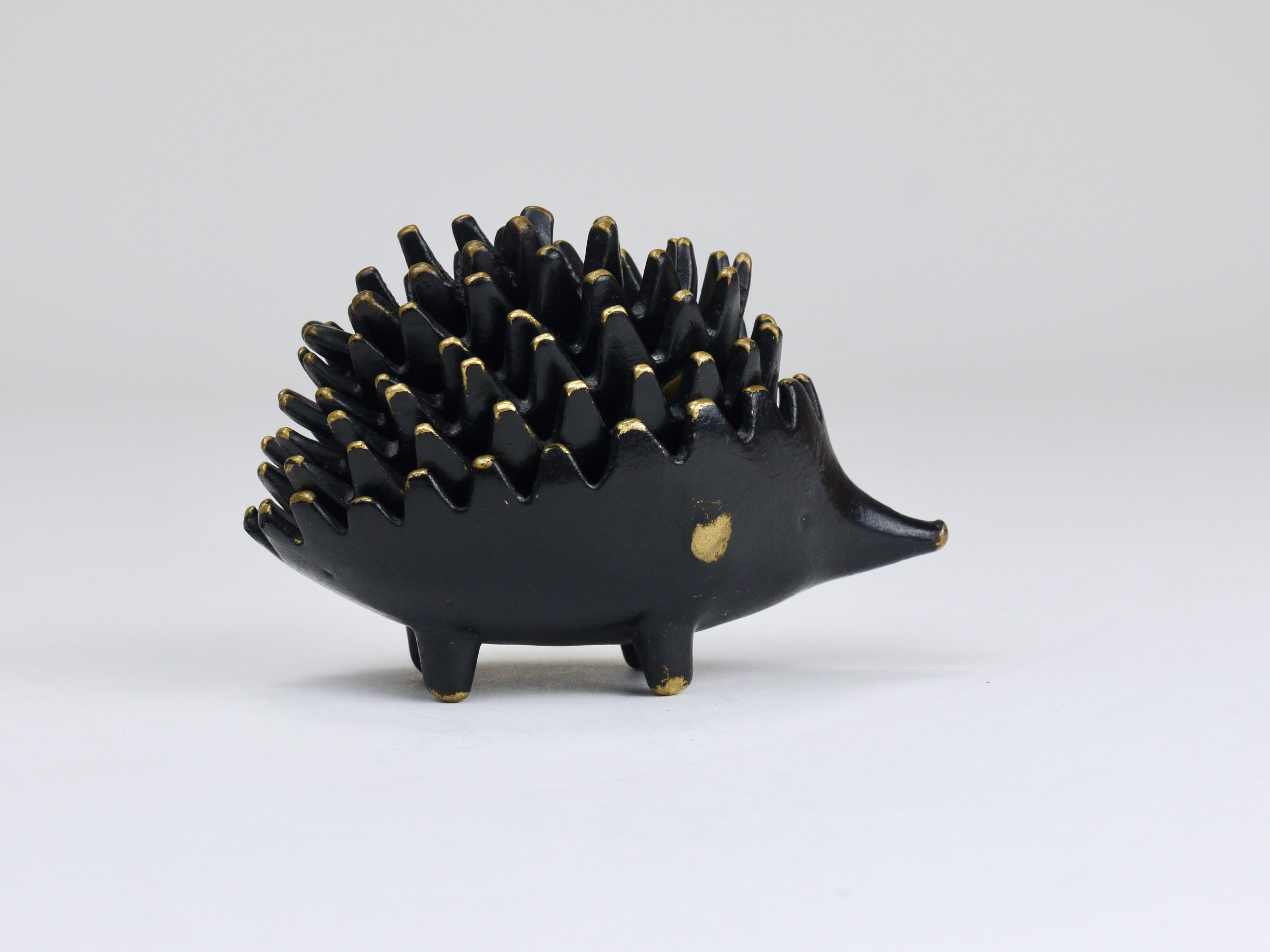 A complete set of six vintage stackable midcentury hedgehog ashtrays. A humorous and charming design by Walter Bosse, executed in the 1950s by Hertha Baller, Austria. Made of solid brass, in good condition with nice patina.
