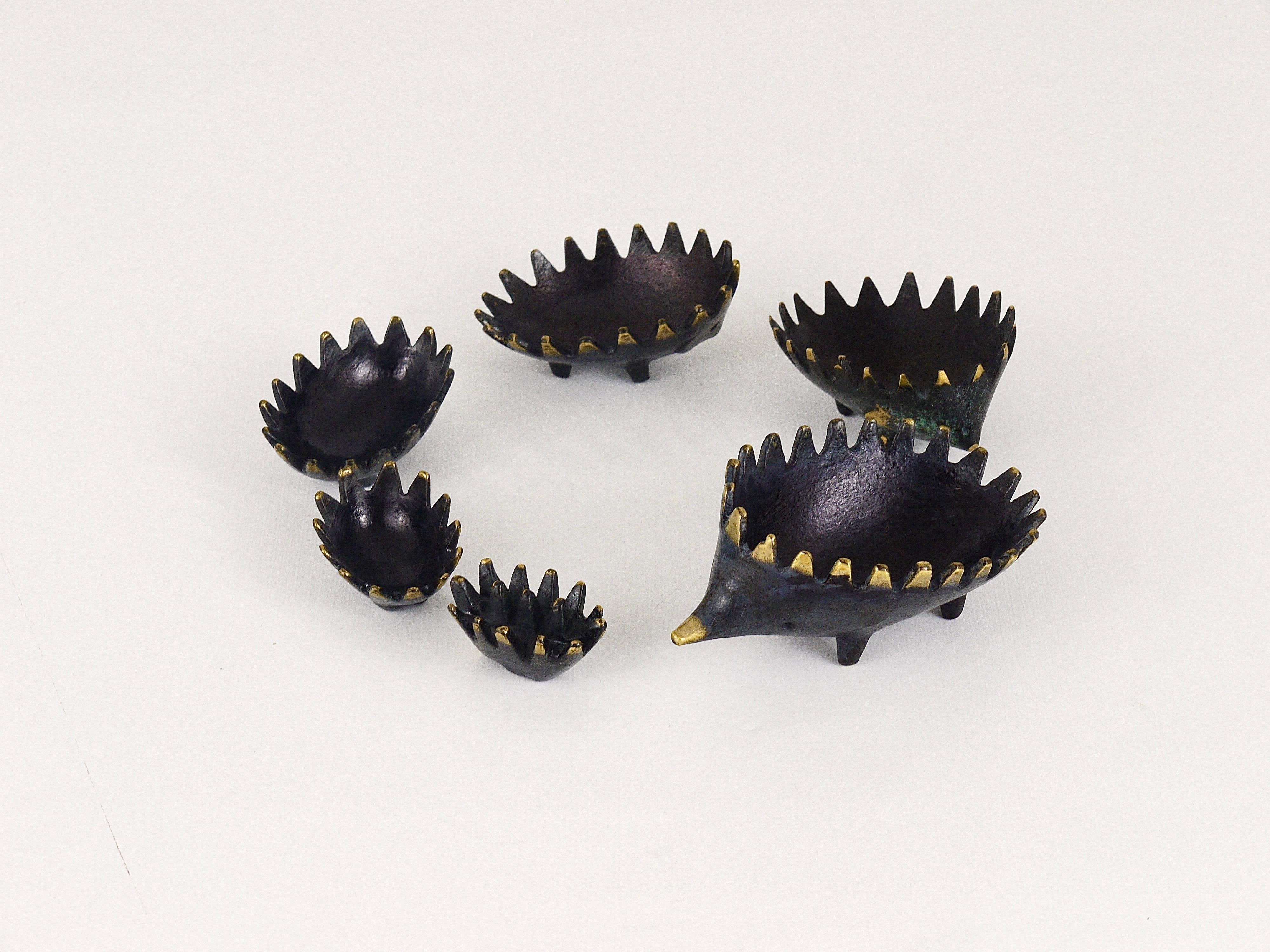 A complete set of six vintage stackable midcentury hedgehog ashtrays. A very humorous design by Walter Bosse, executed by Hertha Baller, Austria in the 1950s. Made of brass, in good condition with nice patina.