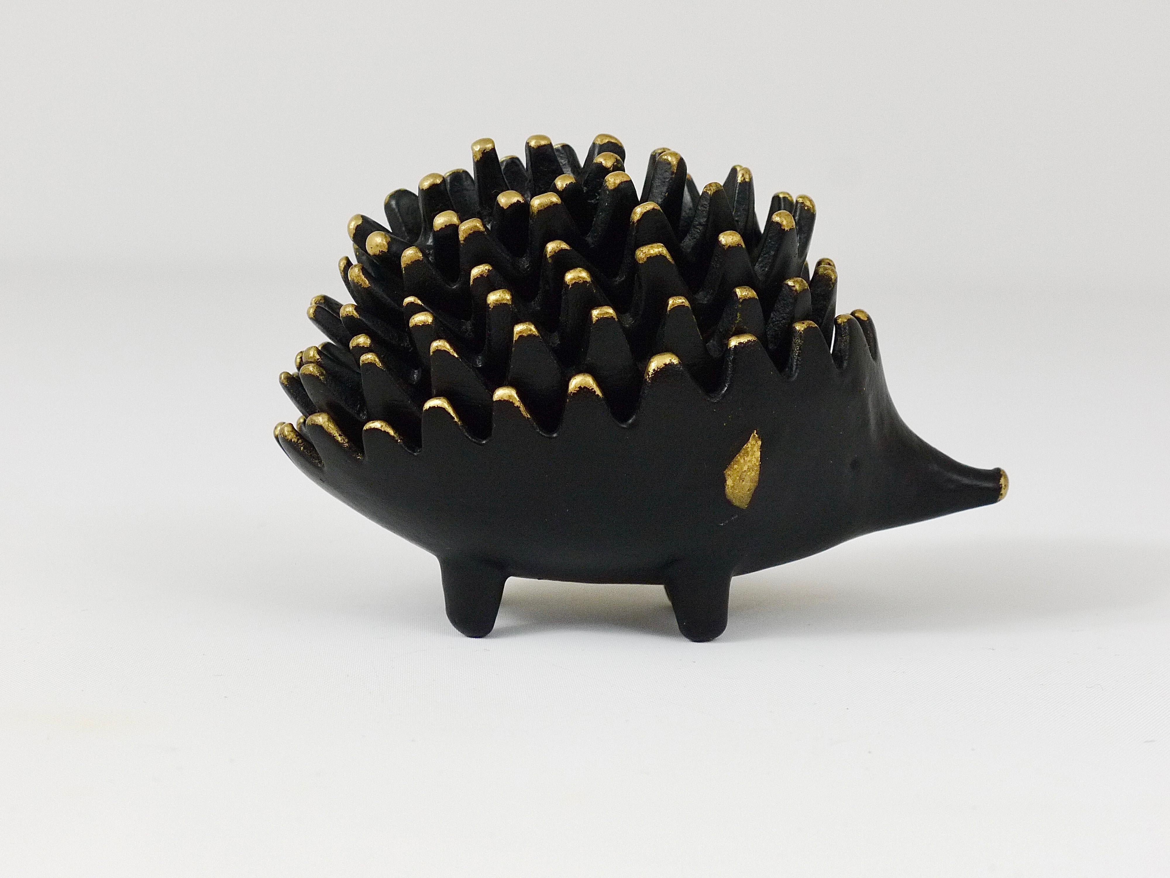 A complete set of six vintage stackable midcentury hedgehog ashtrays. A very humorous design by Walter Bosse, executed by Hertha Baller, Austria in the 1950s. Made of brass, in good condition with marginal patina.