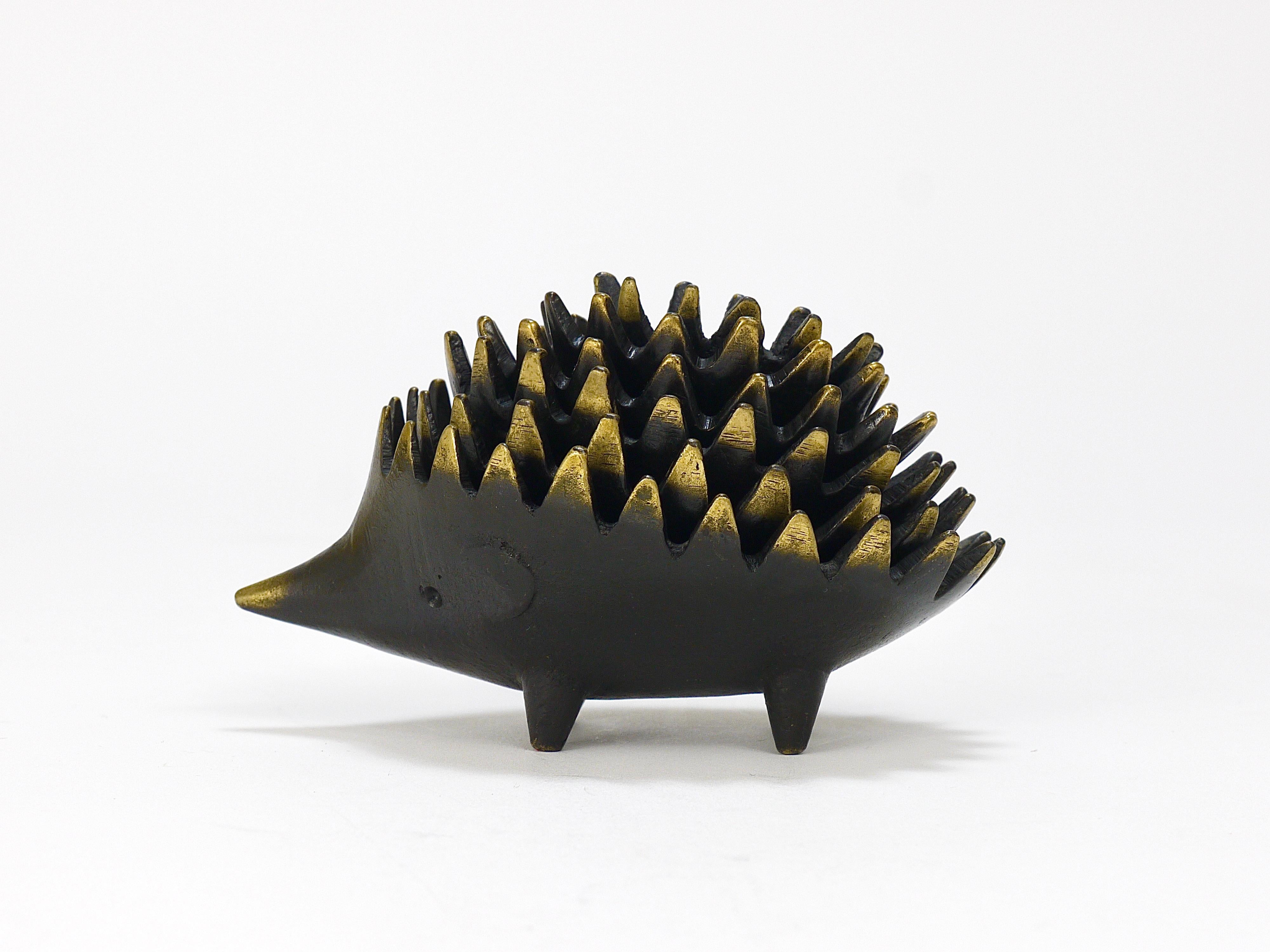 A complete set of six vintage stackable midcentury hedgehog ashtrays. A very humorous and charming design by Walter Bosse, executed by Hertha Baller, Austria in the 1950s. Made of brass, in remarkable above-average good condition.