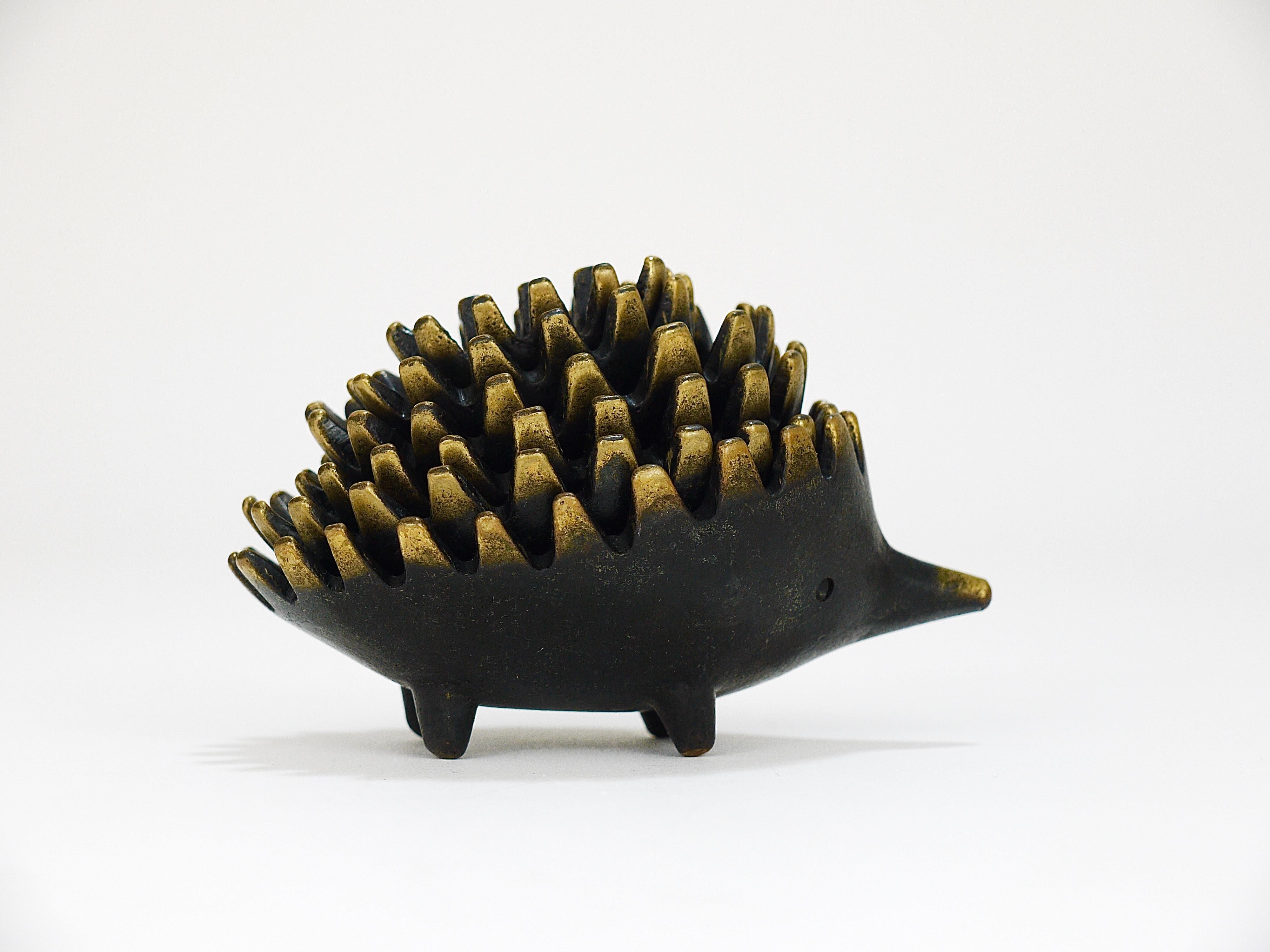 A complete set of six vintage stackable midcentury hedgehog ashtrays. A very humorous and charming design by Walter Bosse, executed by Hertha Baller, Austria in the 1950s. Made of brass, in remarkable above-average good condition.